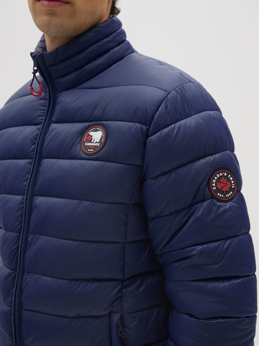 Blue padded jacket with zip_3