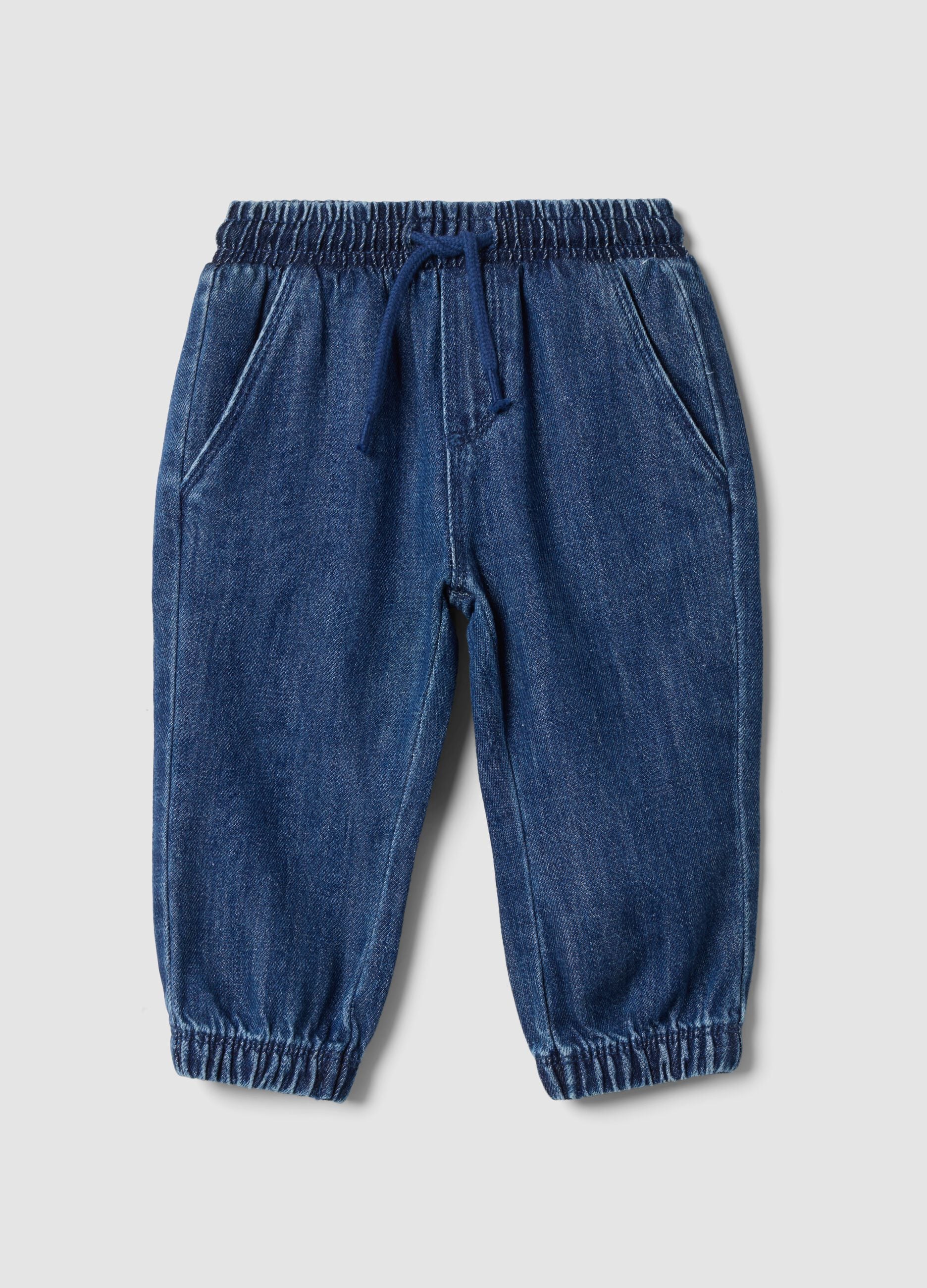 Blue denim trousers in a cotton and viscose blend with elasticated waist