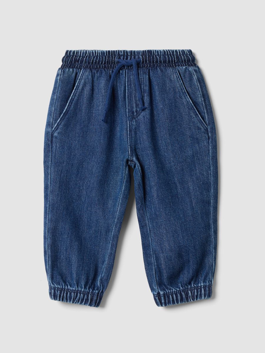 Blue denim trousers in a cotton and viscose blend with elasticated waist_0