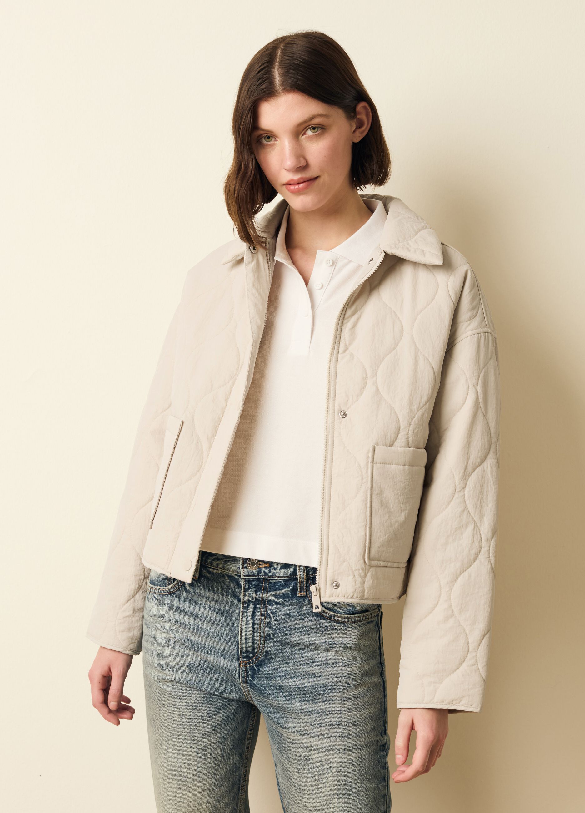 Short quilted jacket with buttons