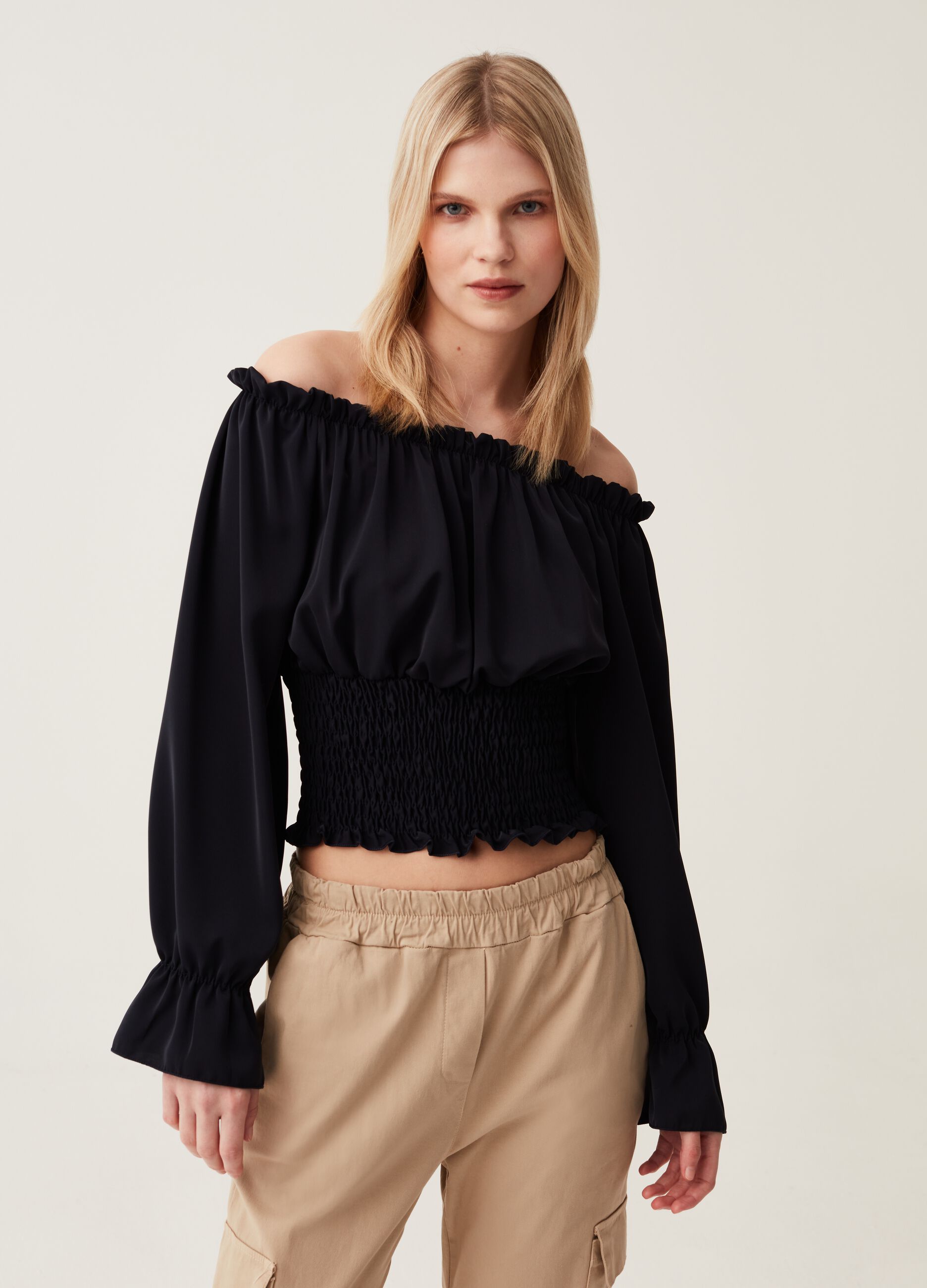 Blusa con punto smock Hybrid_0