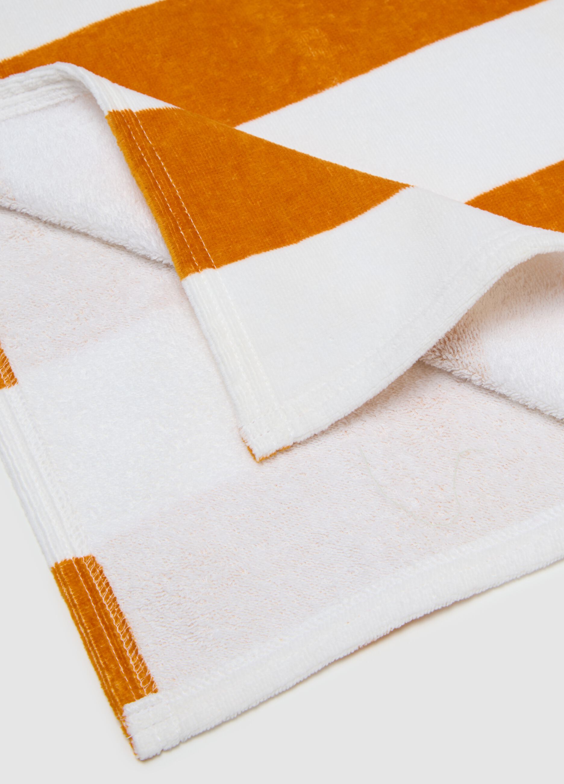 Orange and white striped cotton baby poncho