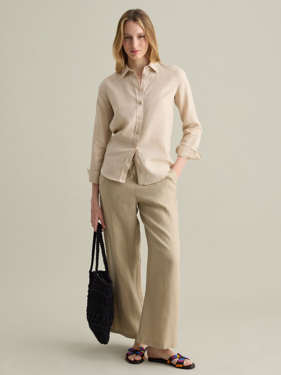 Beige wide-leg fluid trousers in linen_0