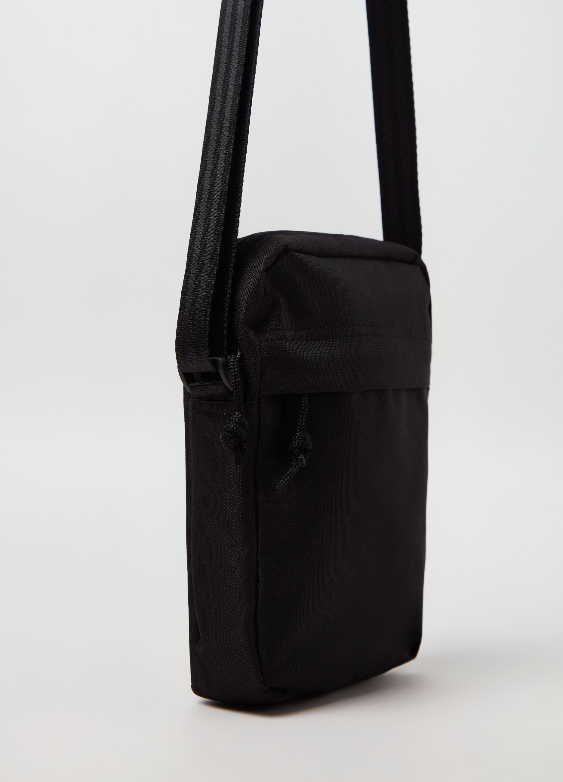 Bag with shoulder strap.