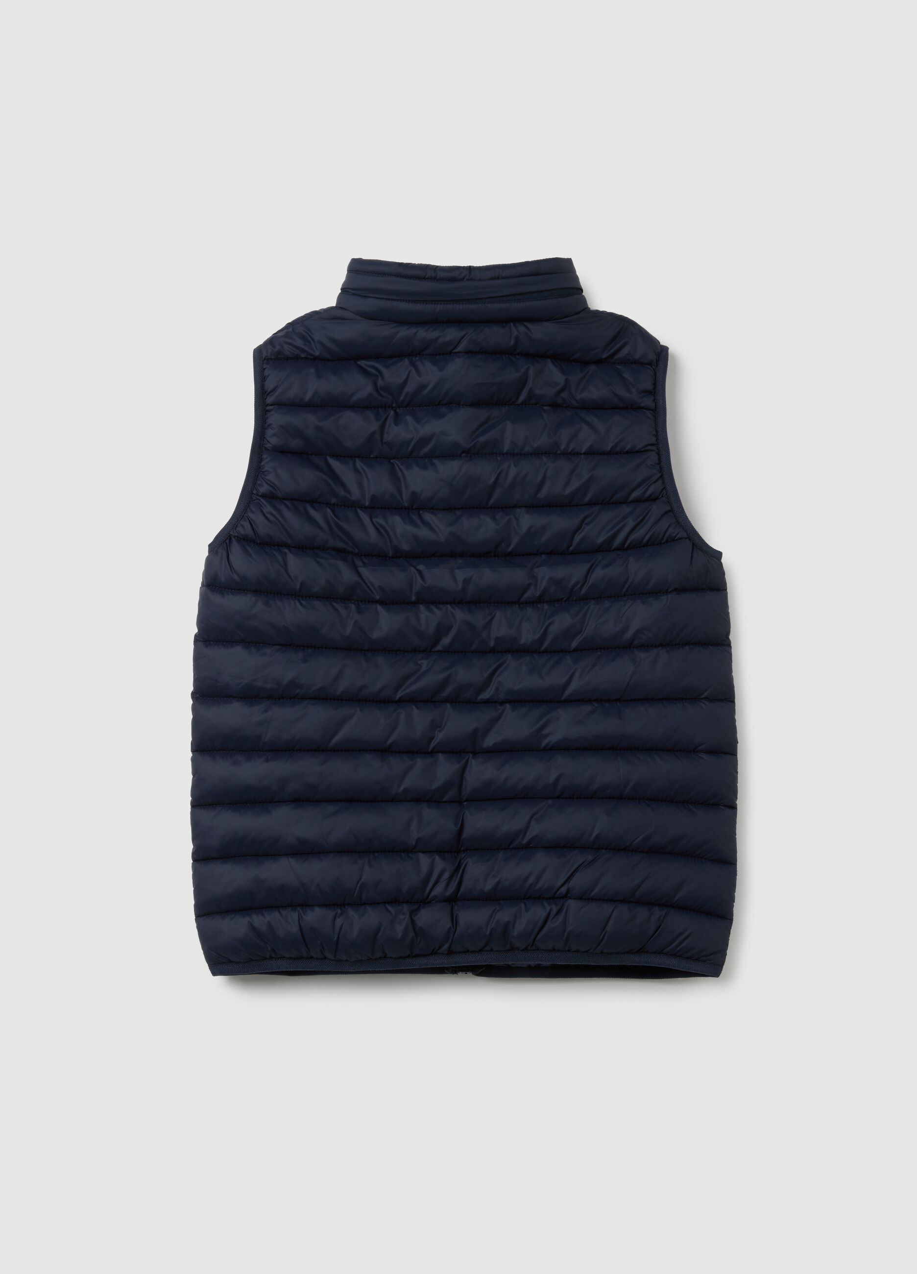 Boy's blue gilet with high collar