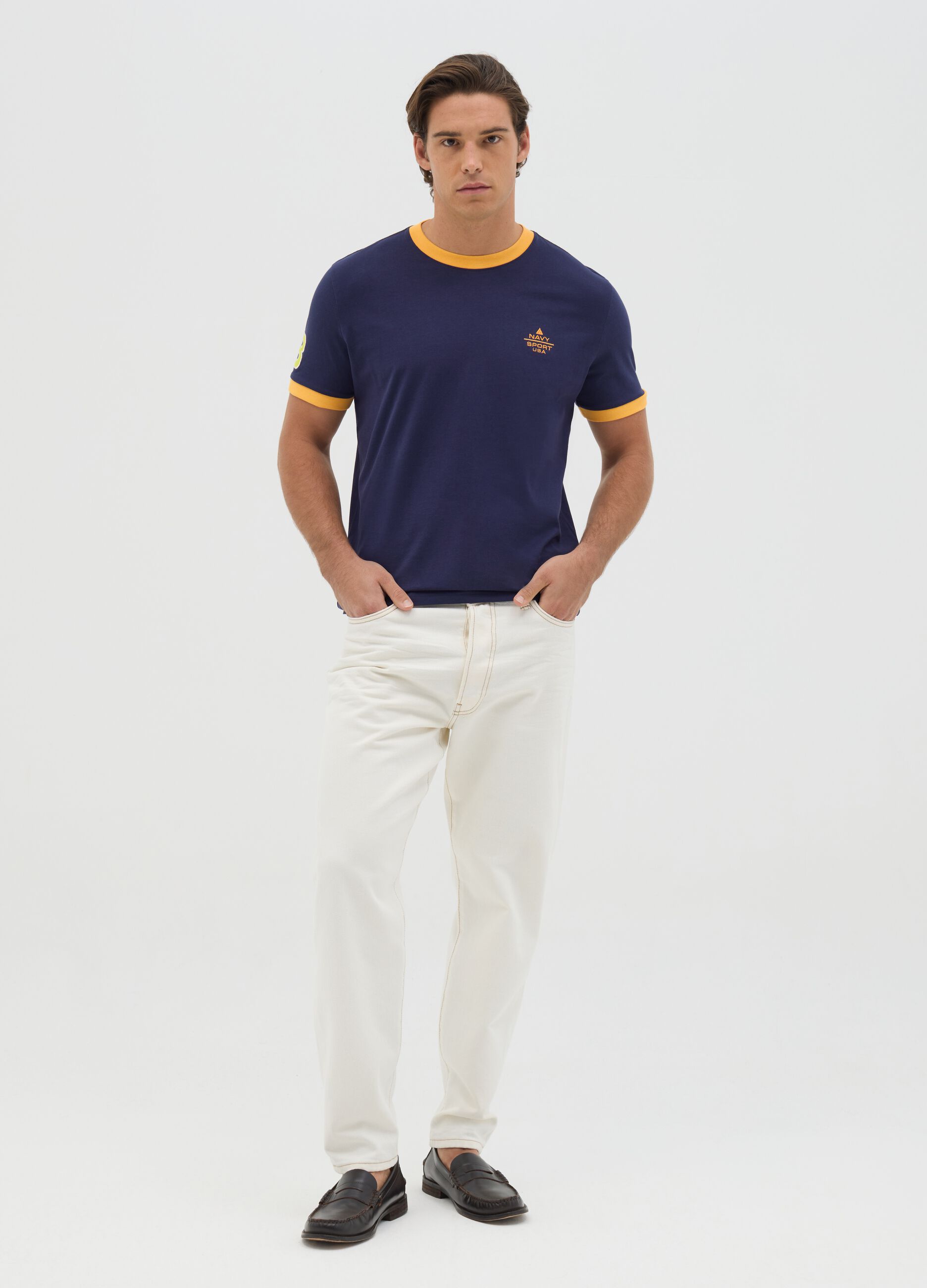 Blue T-shirt with short sleeves and orange details
