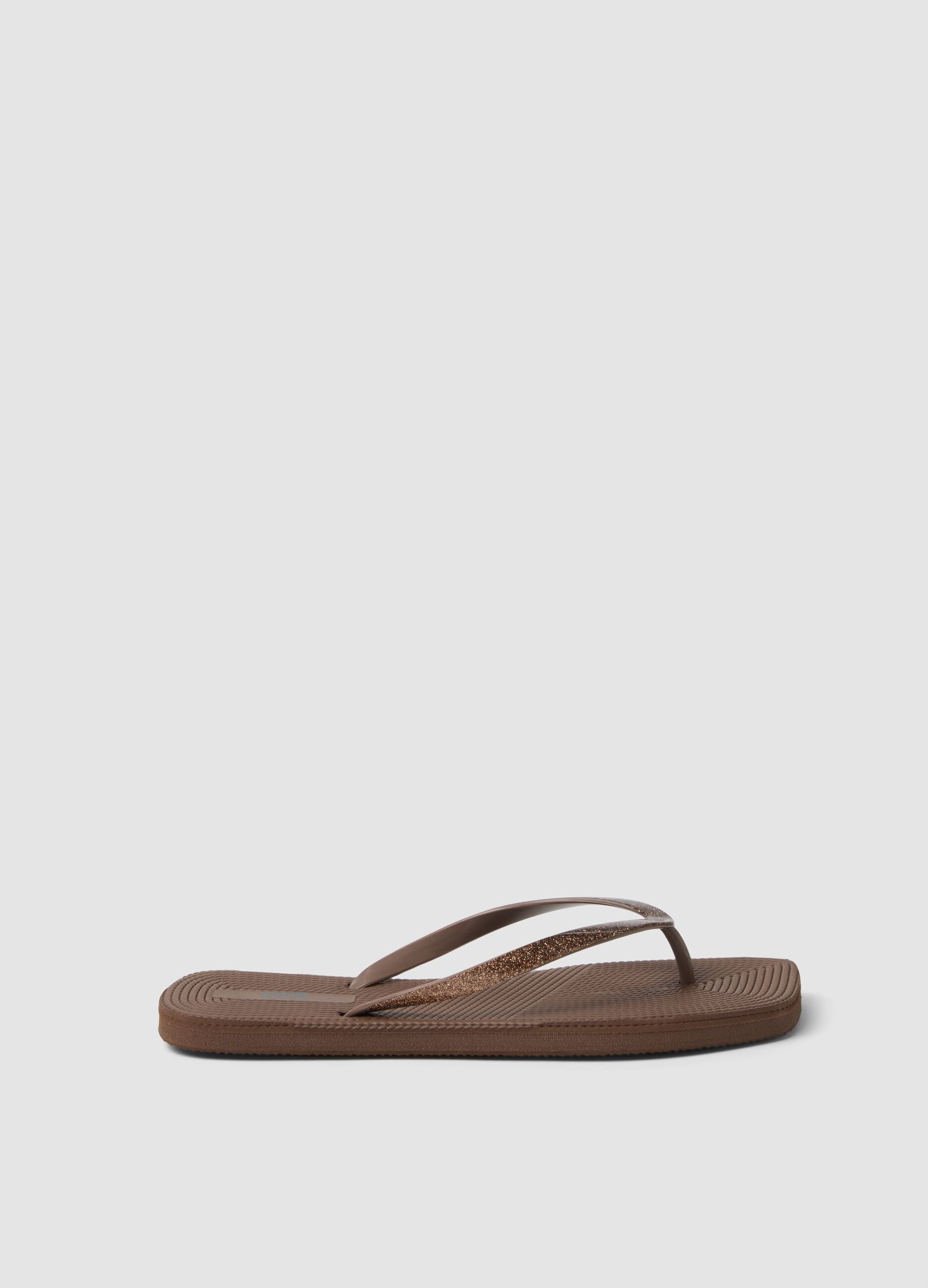 Brown flip-flops with glitter straps