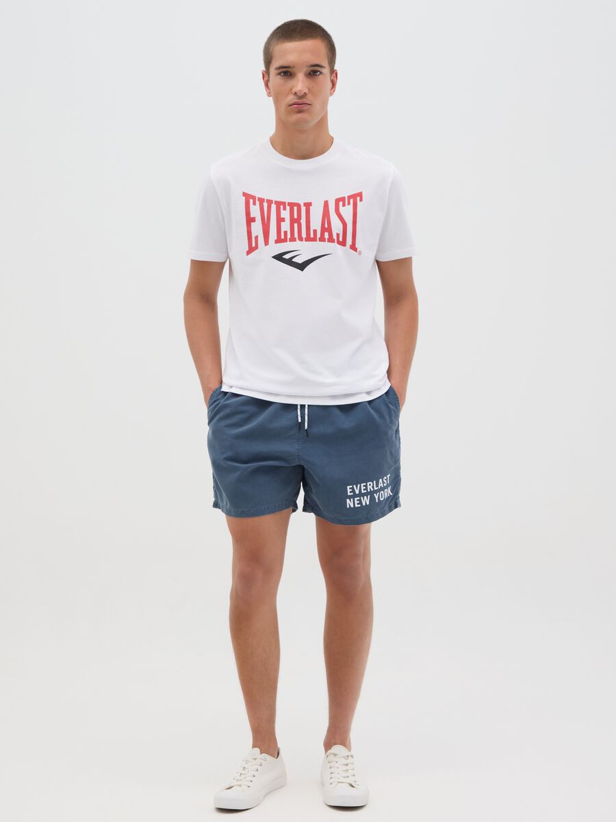 Blue swimming trunks with logo print_0