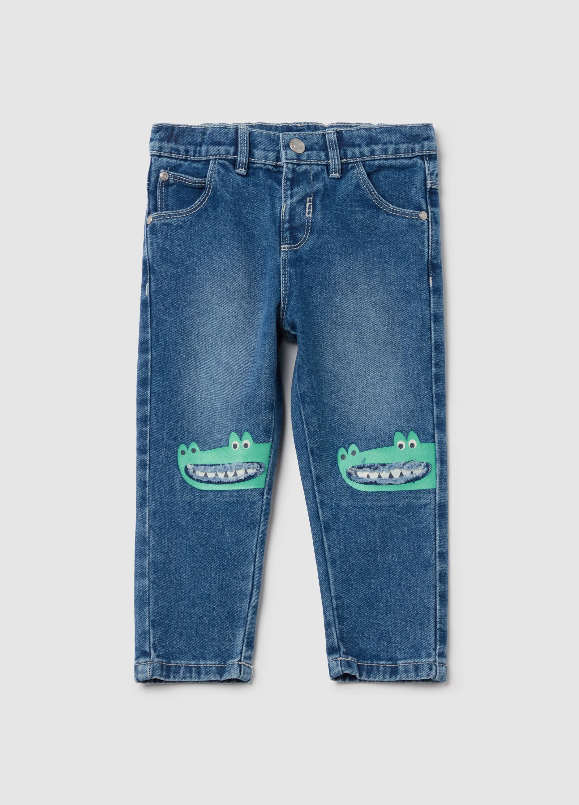 Five-pocket jeans with crocodiles print