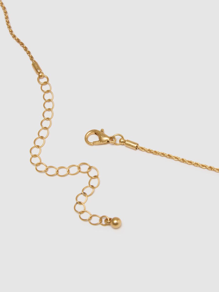 Collana lunga in acciaio color oro con pendenti_1