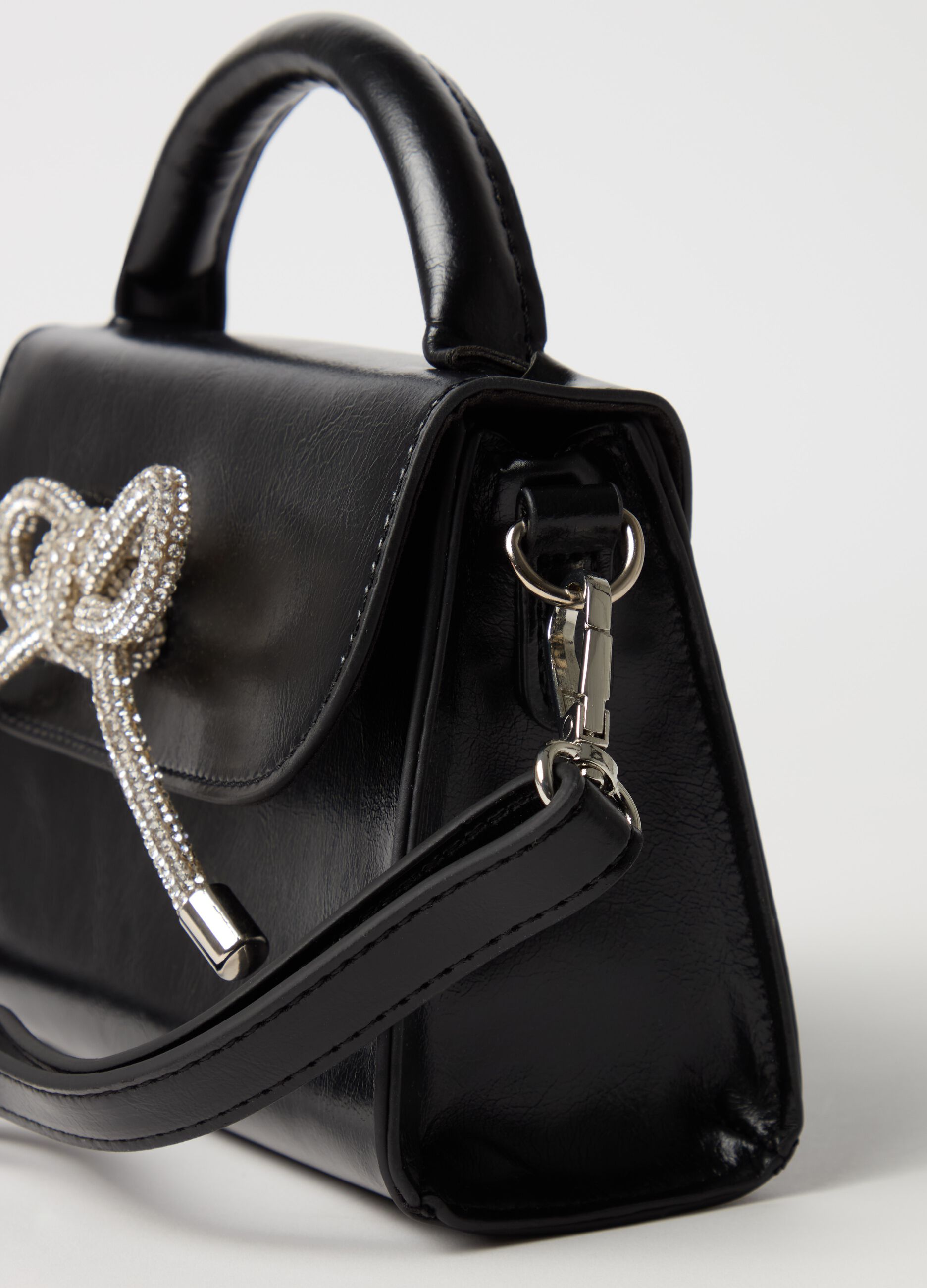 Glossy-effect bag with diamanté knot