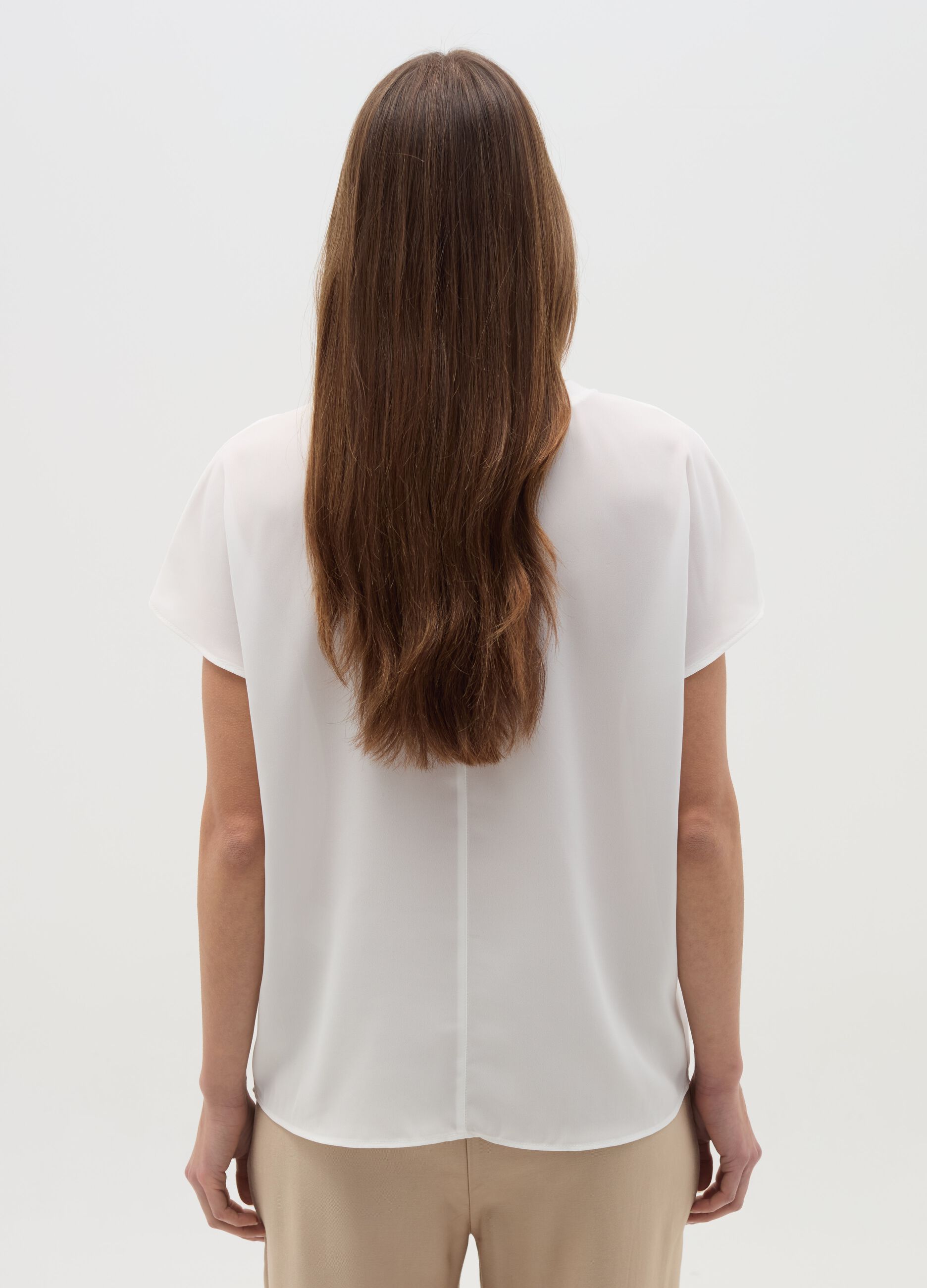 Blusa in crêpe tinta unita