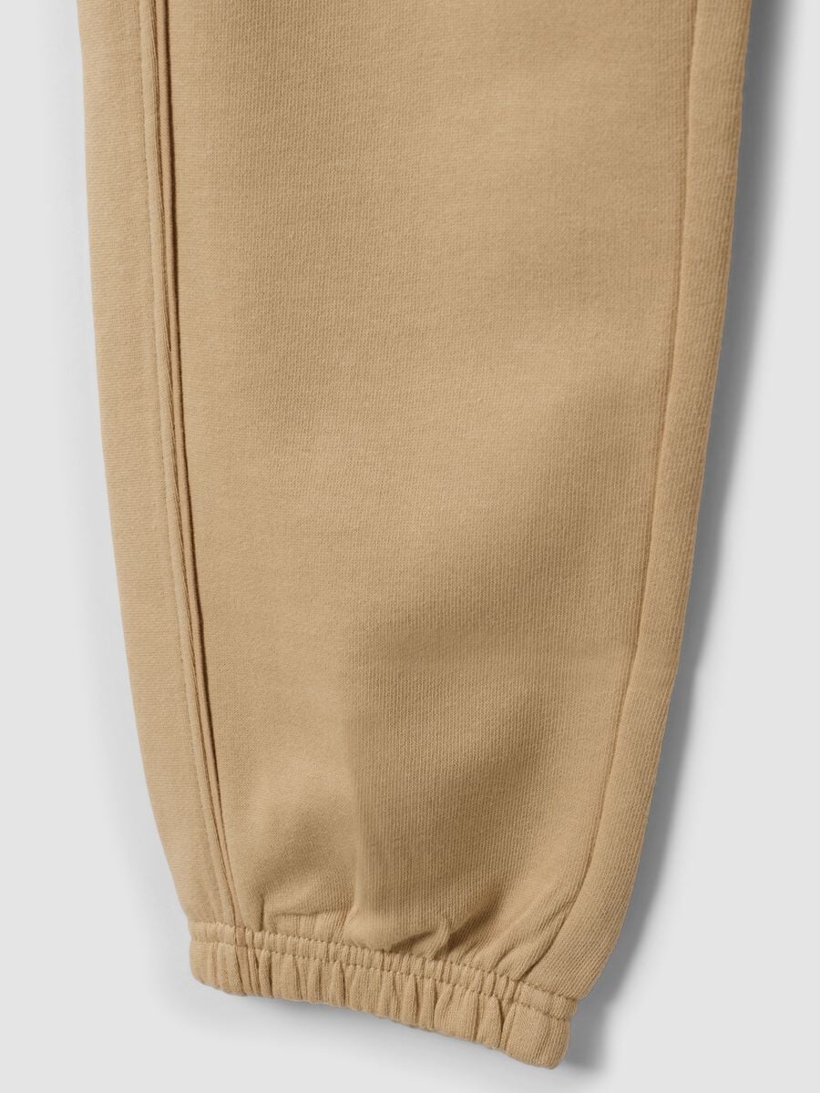 Pantaloni jogger beige in puro cotone organico comfort fit per bambino_3