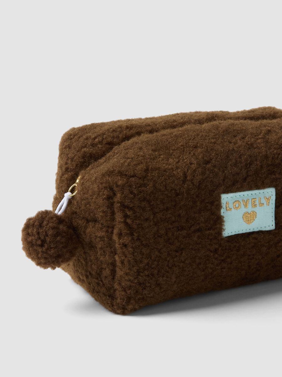 Beauty case marrone con pompon_1