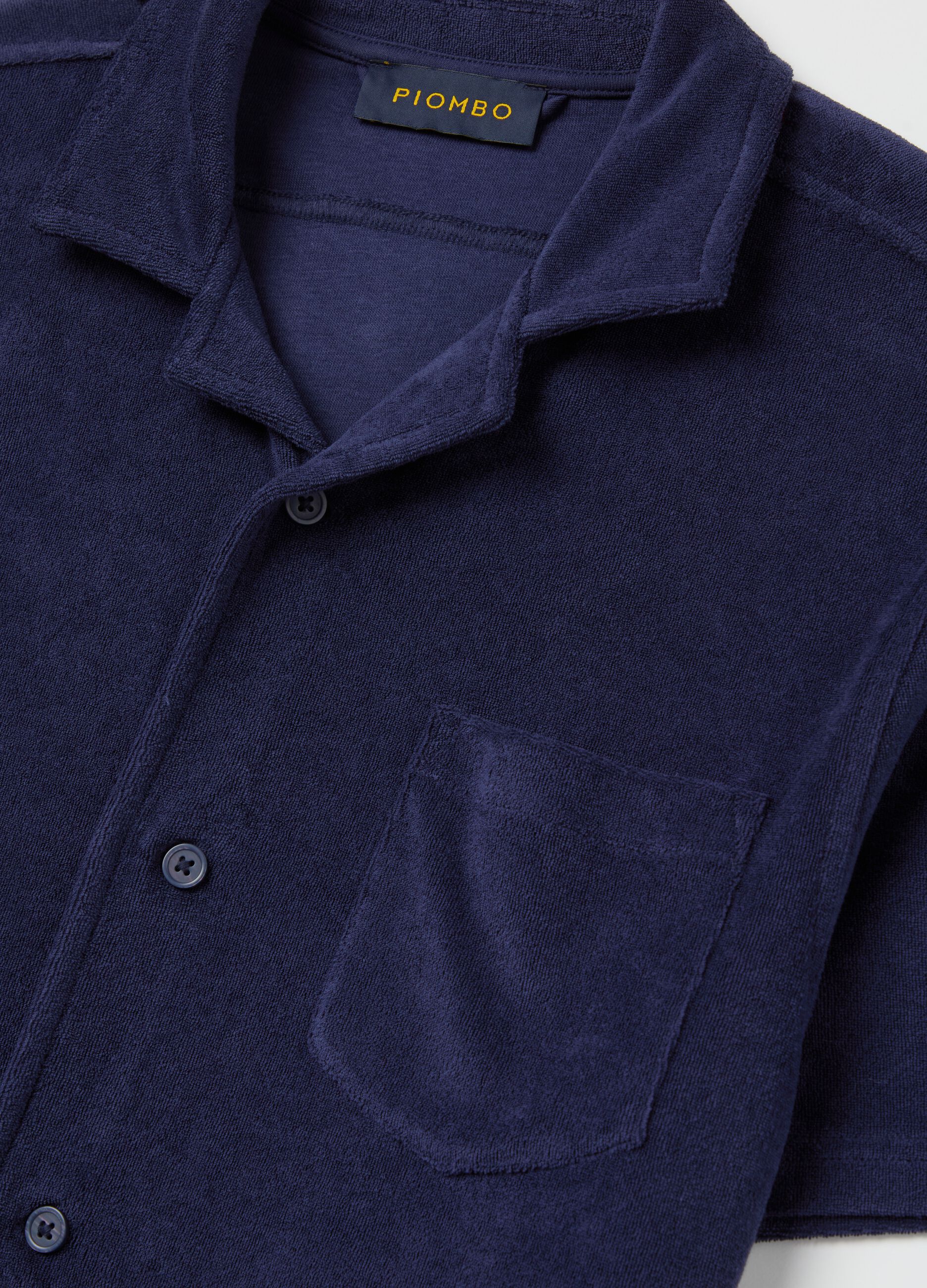 Polo shirt in chenille with pocket