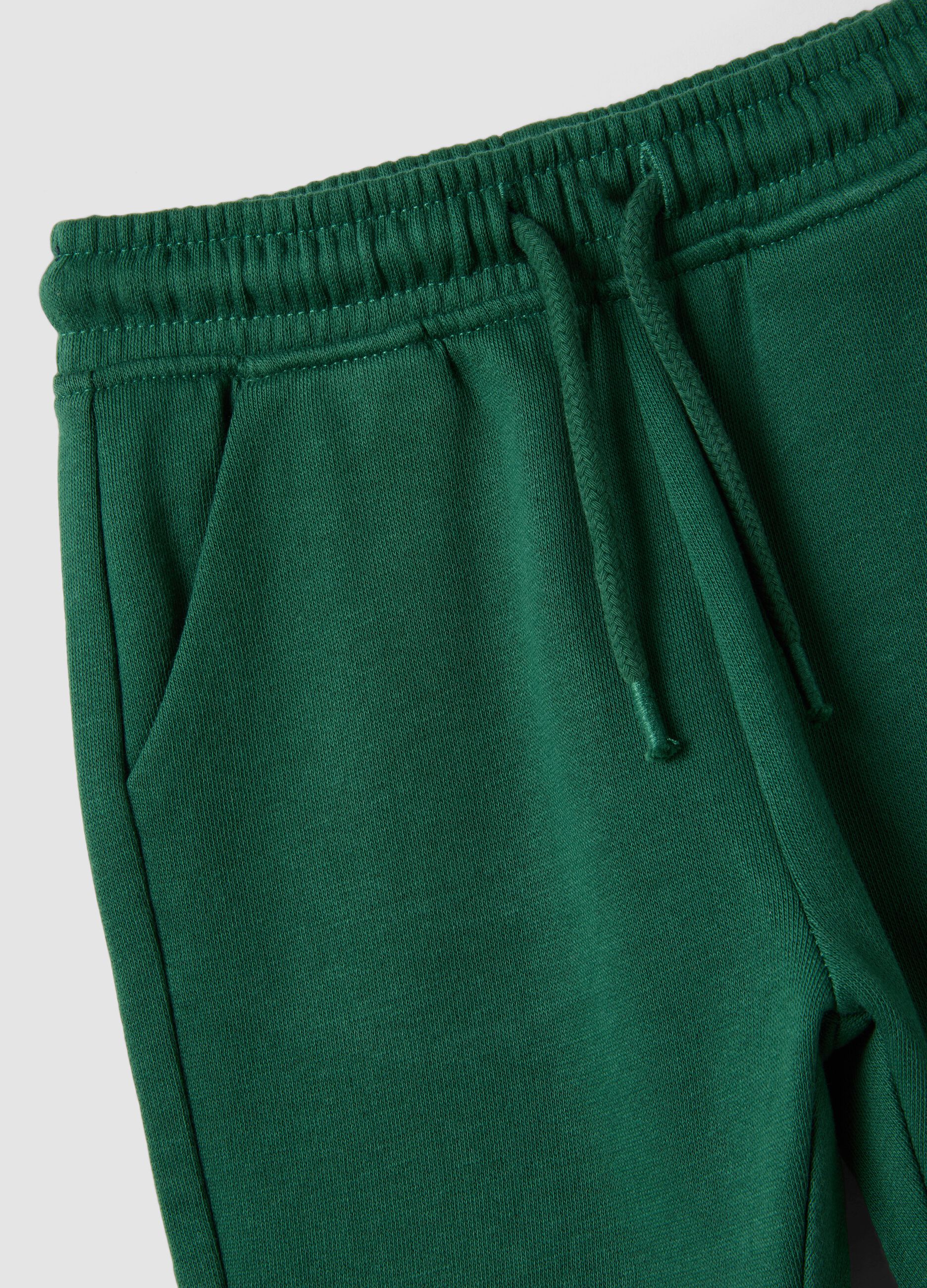 Pantaloni jogger verdi in puro cotone organico con coulisse per bimbo