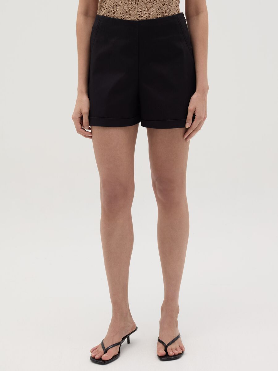 Tailored shorts with turn ups_1