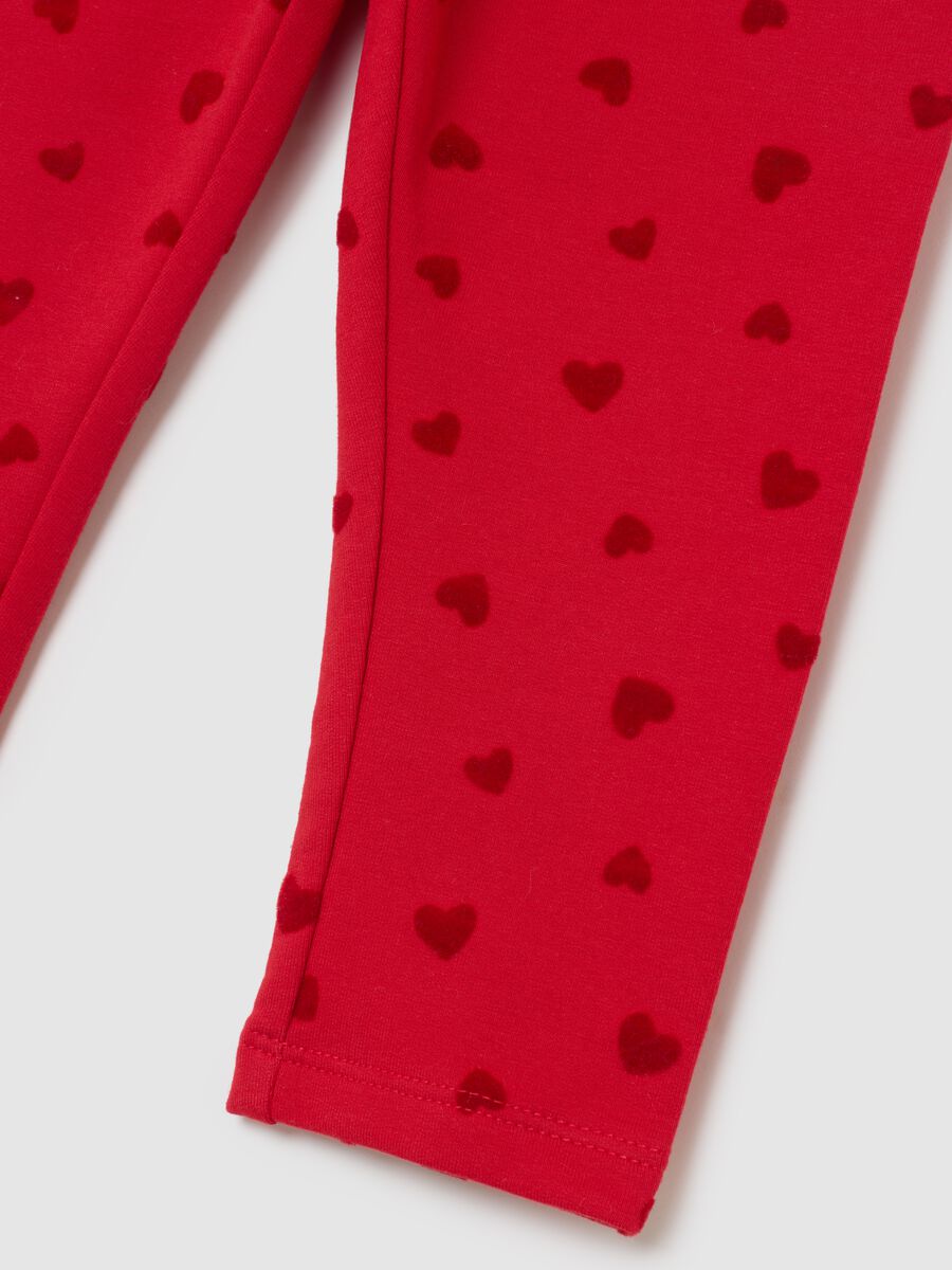 Red leggings for girls in stretch cotton with heart prints_3