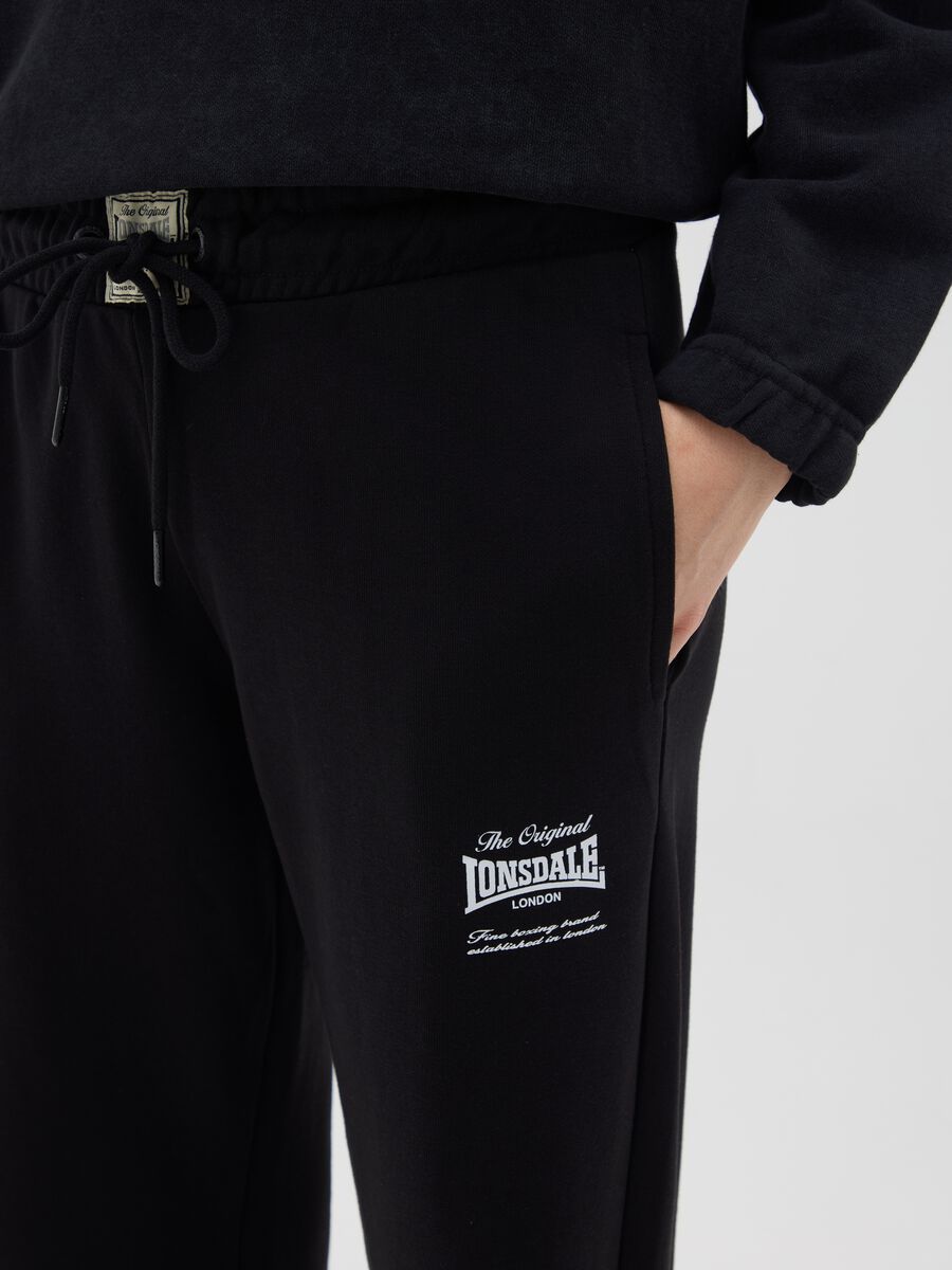 Tuta in cotone nero con logo_3