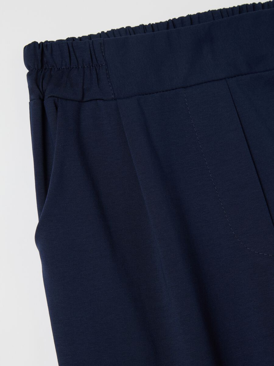 Blue cropped trousers with turn-ups_5