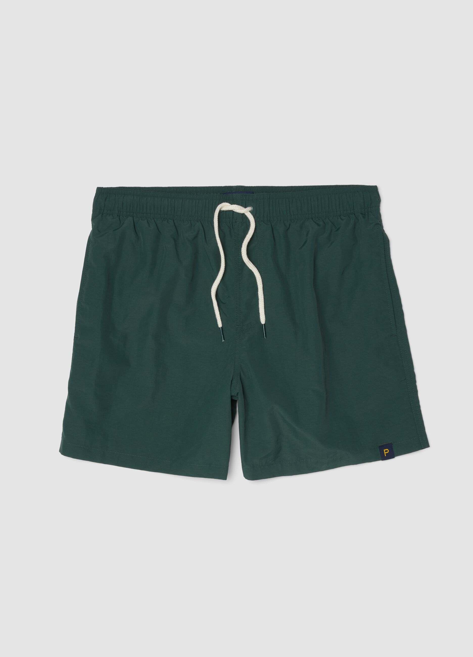 Green swim shorts with elasticated waistband and drawstring