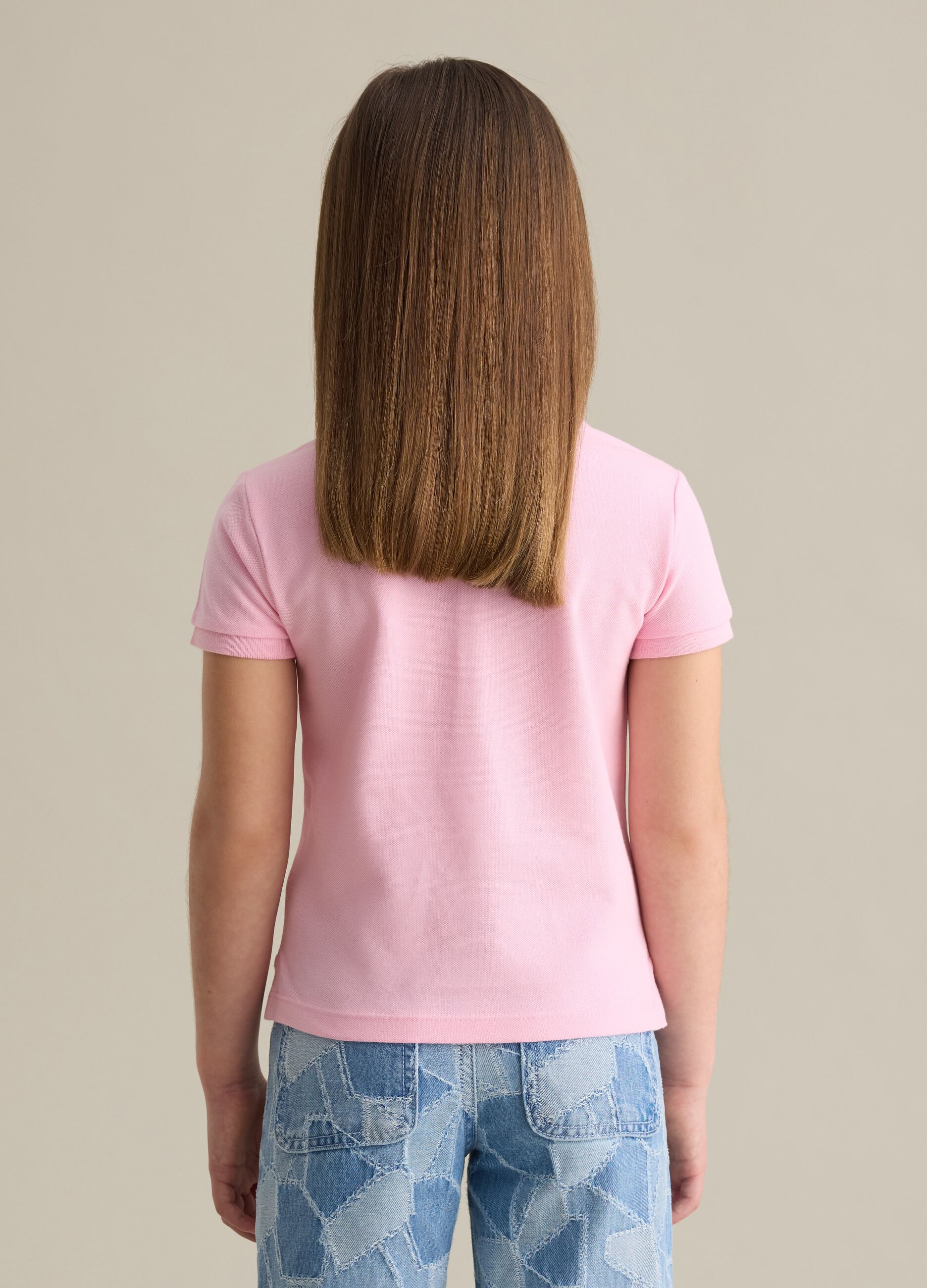 Cotton polo shirt with embroidered flowers