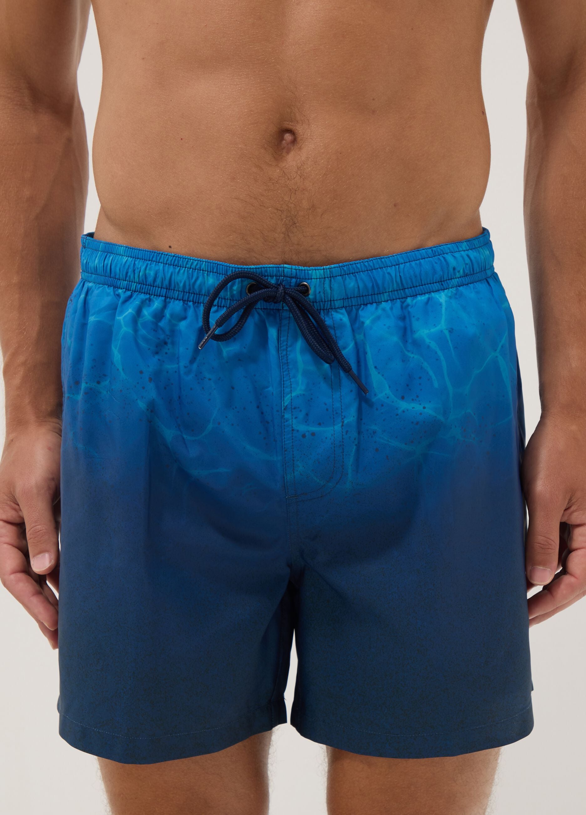 Blue ombr&eacute; swim shorts with elasticated waist