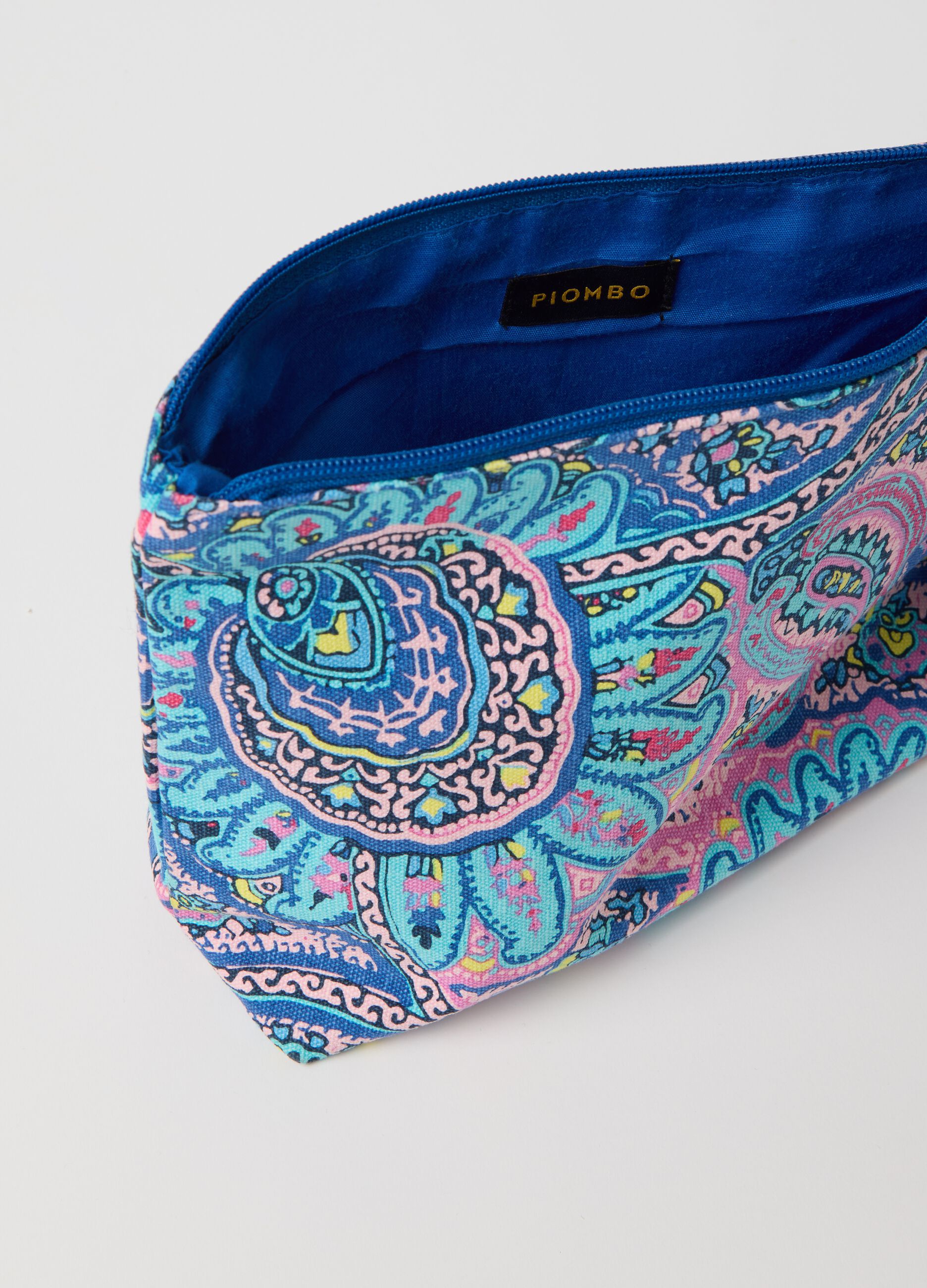 Clutch bag with tassel and paisley print