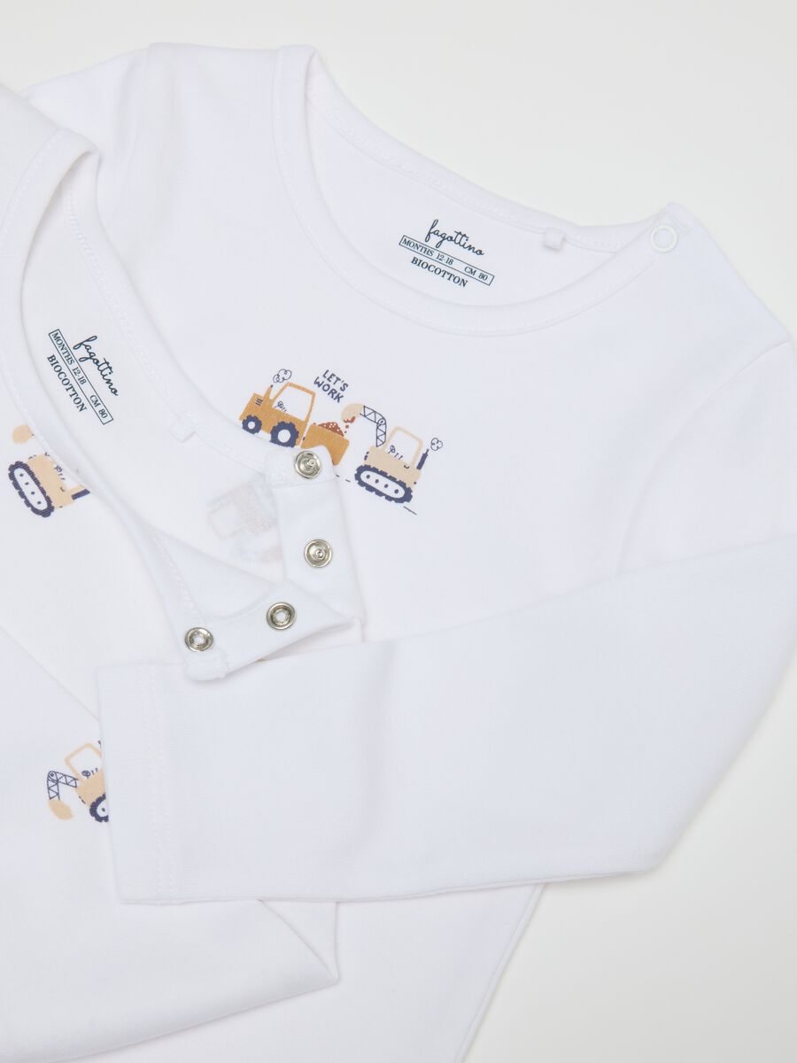 Newborn girl's bi-pack bodysuits in pure white cotton_3