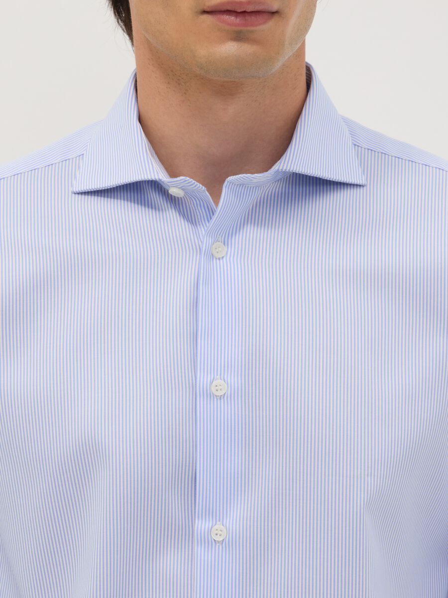 Camicia azzurra in puro cotone no iron slim fit_1