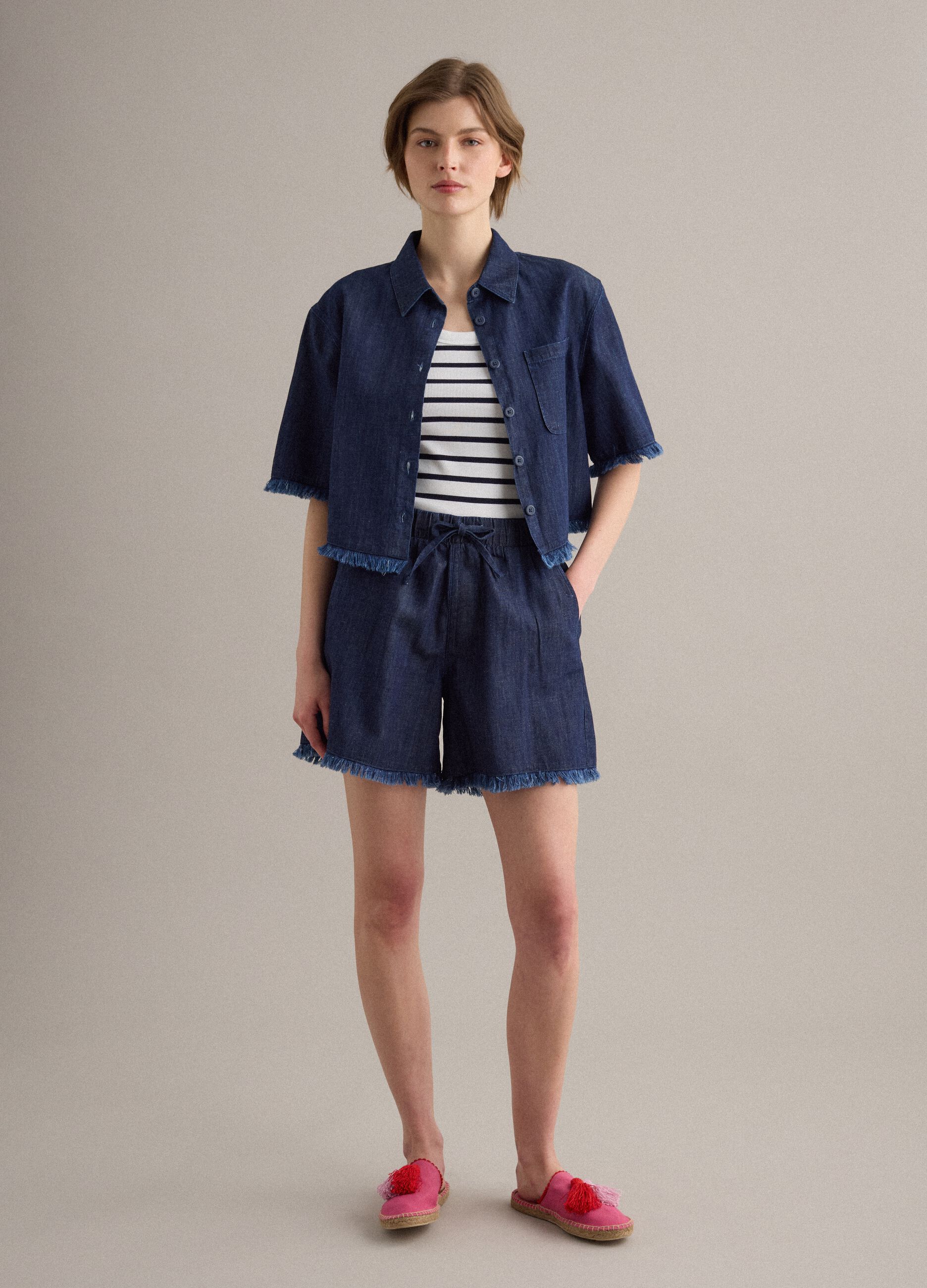 Blue denim shirt in cotton blend, oversized fit with frayed hem