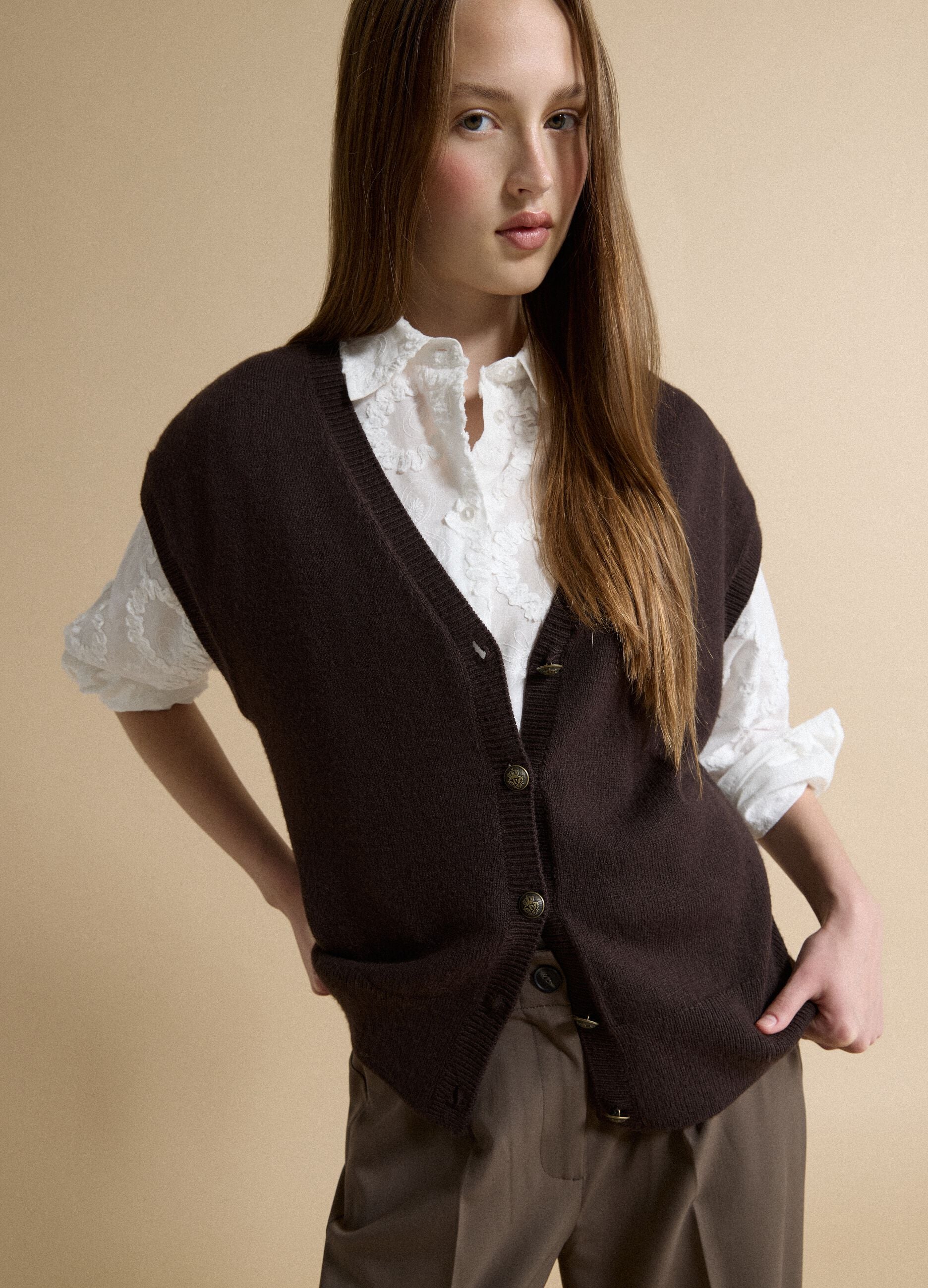 Brown V-neck button-up vest with oversized fit