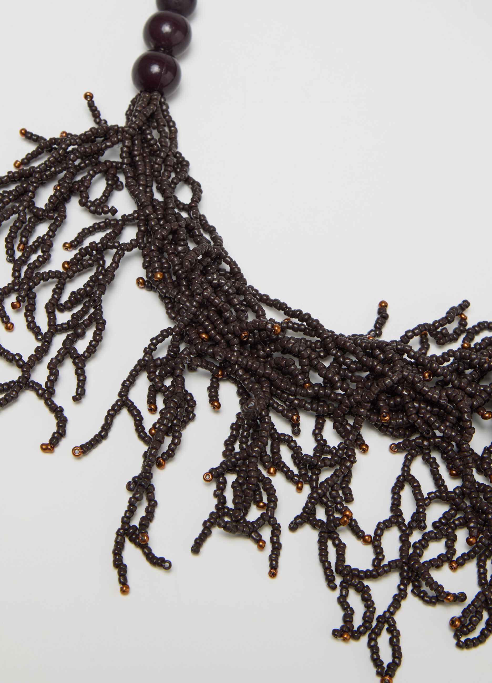Black necklace with pearls and strands of beads