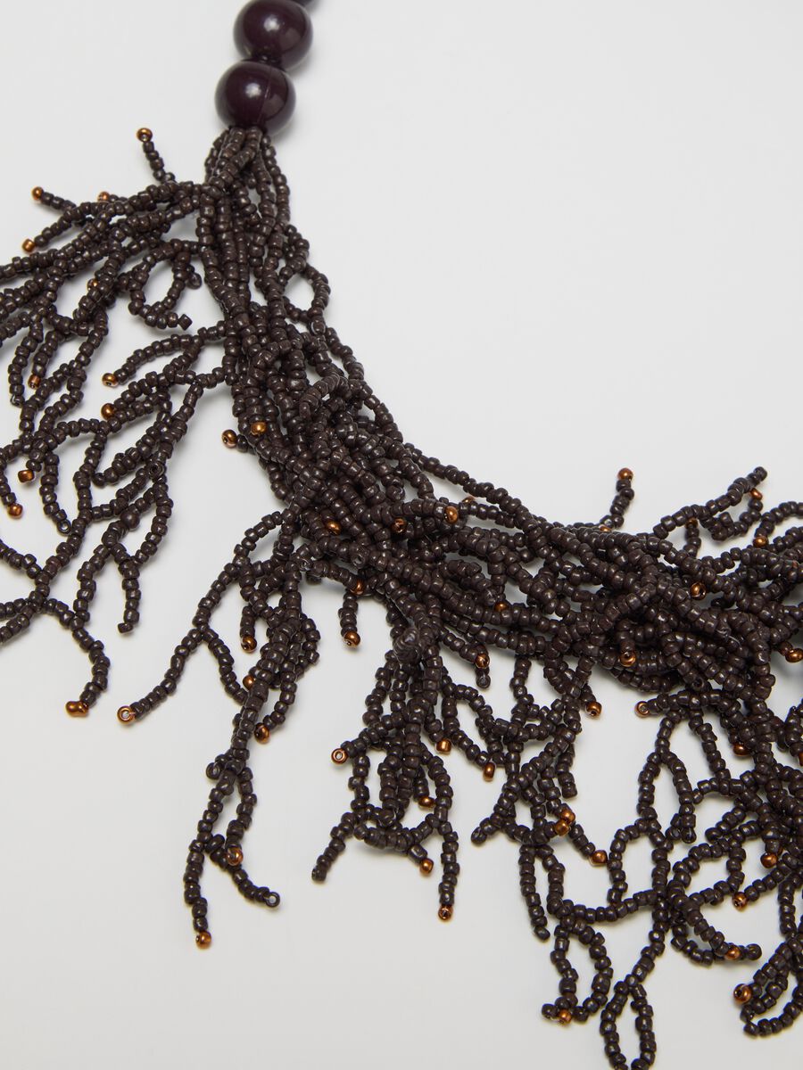 Black necklace with pearls and strands of beads_2