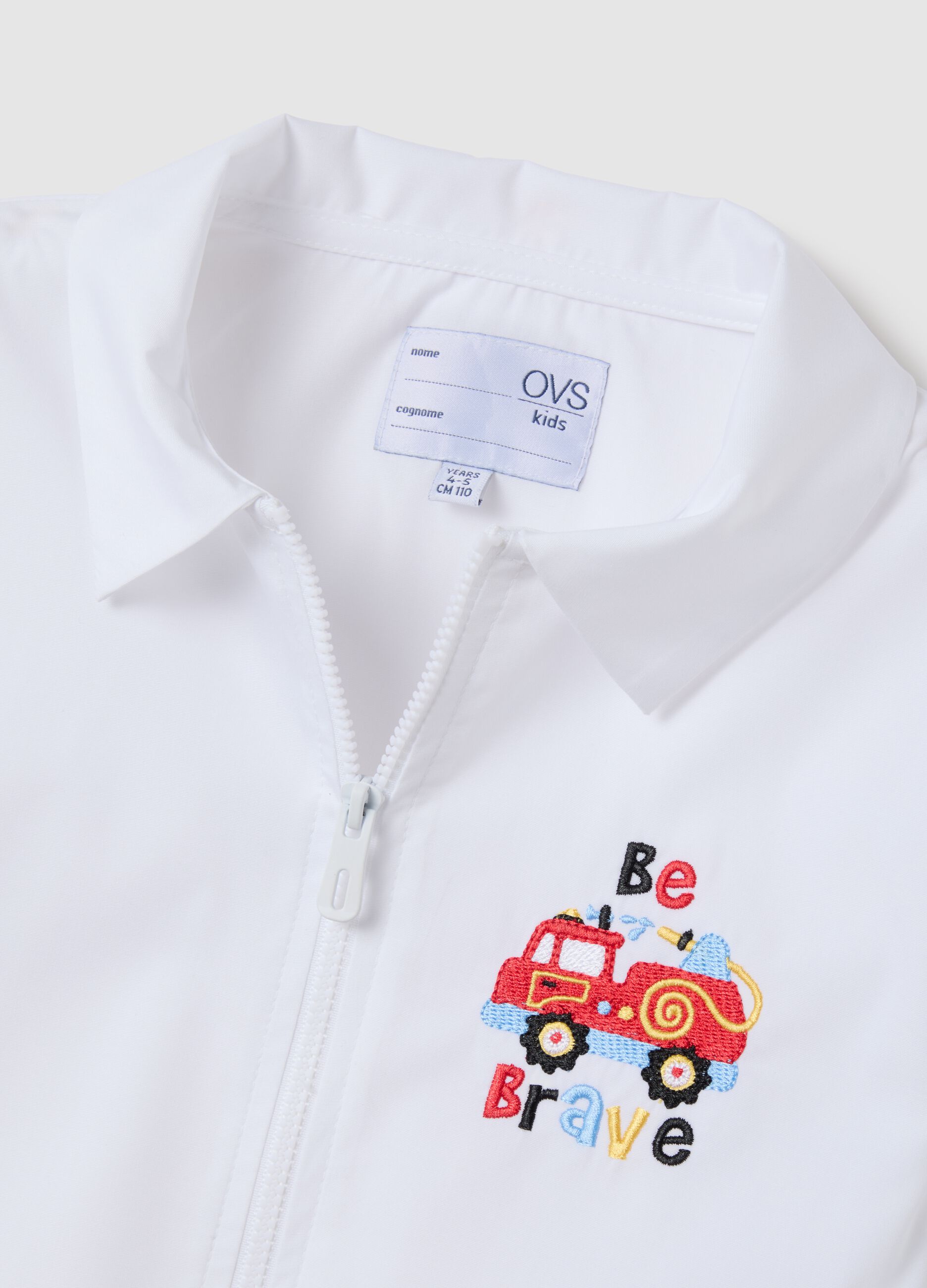 Children's school smock in white cotton blend with embroidery