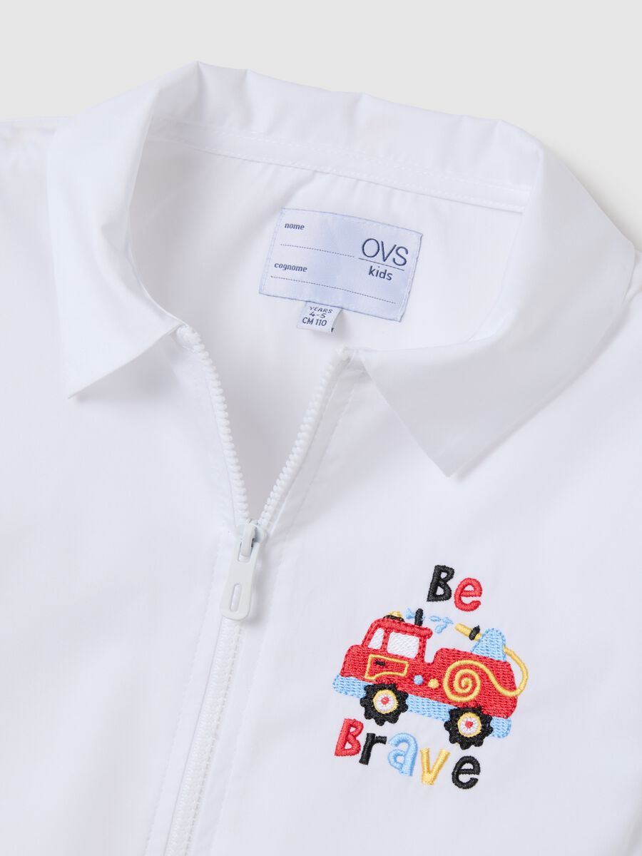 Children's school smock in white cotton blend with embroidery_2