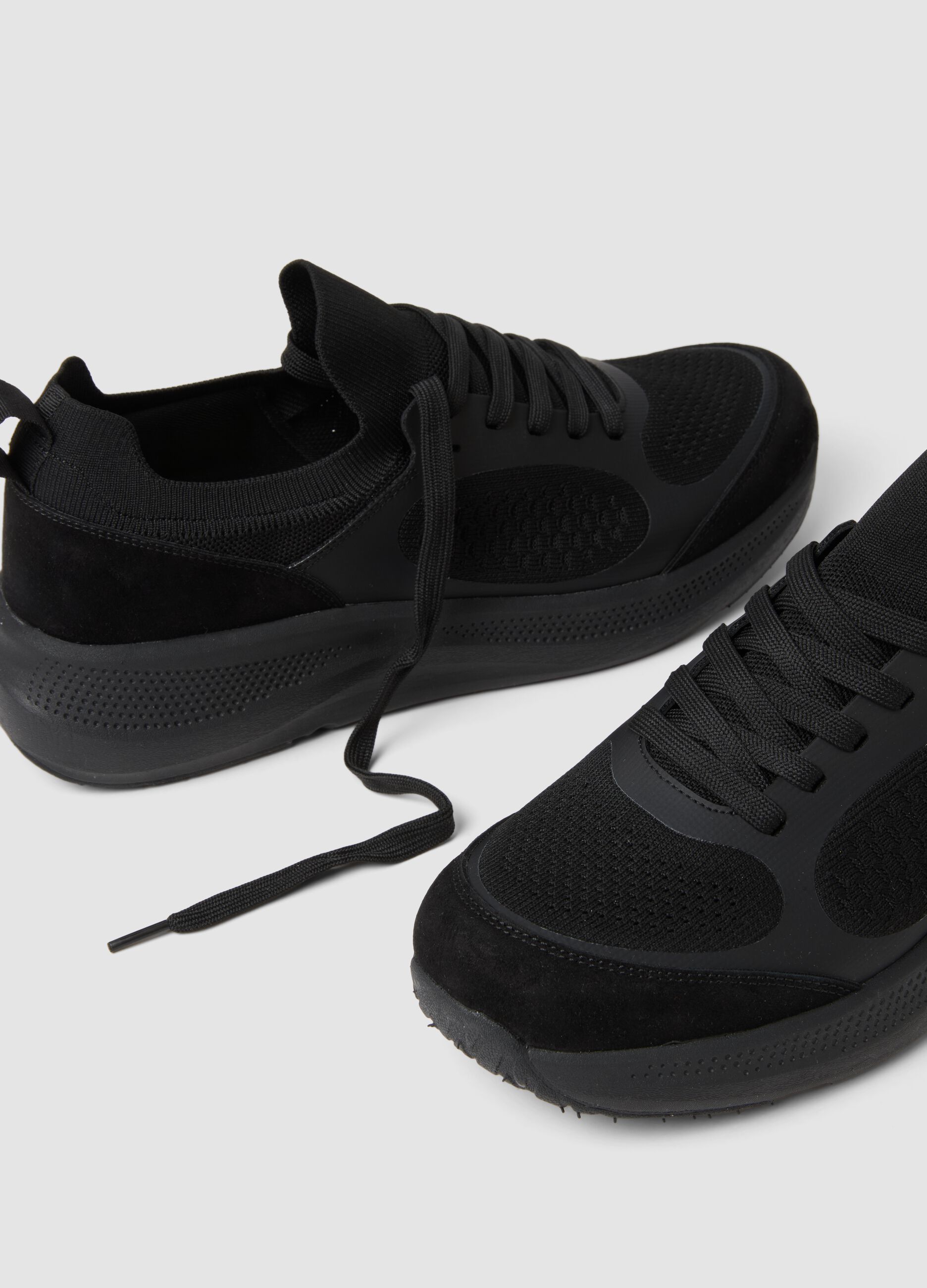 Black sports trainers