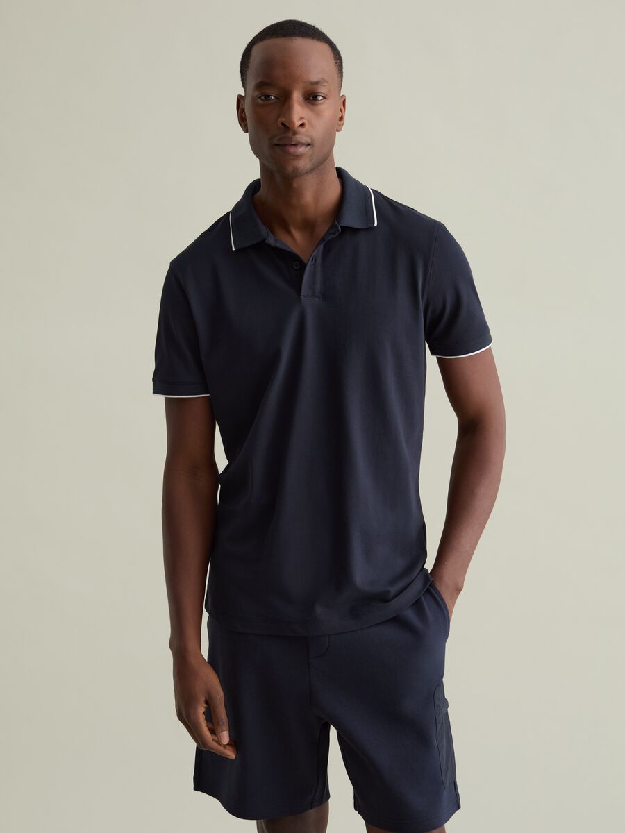 Polo shirt in technical fabric with contrasting edging_0