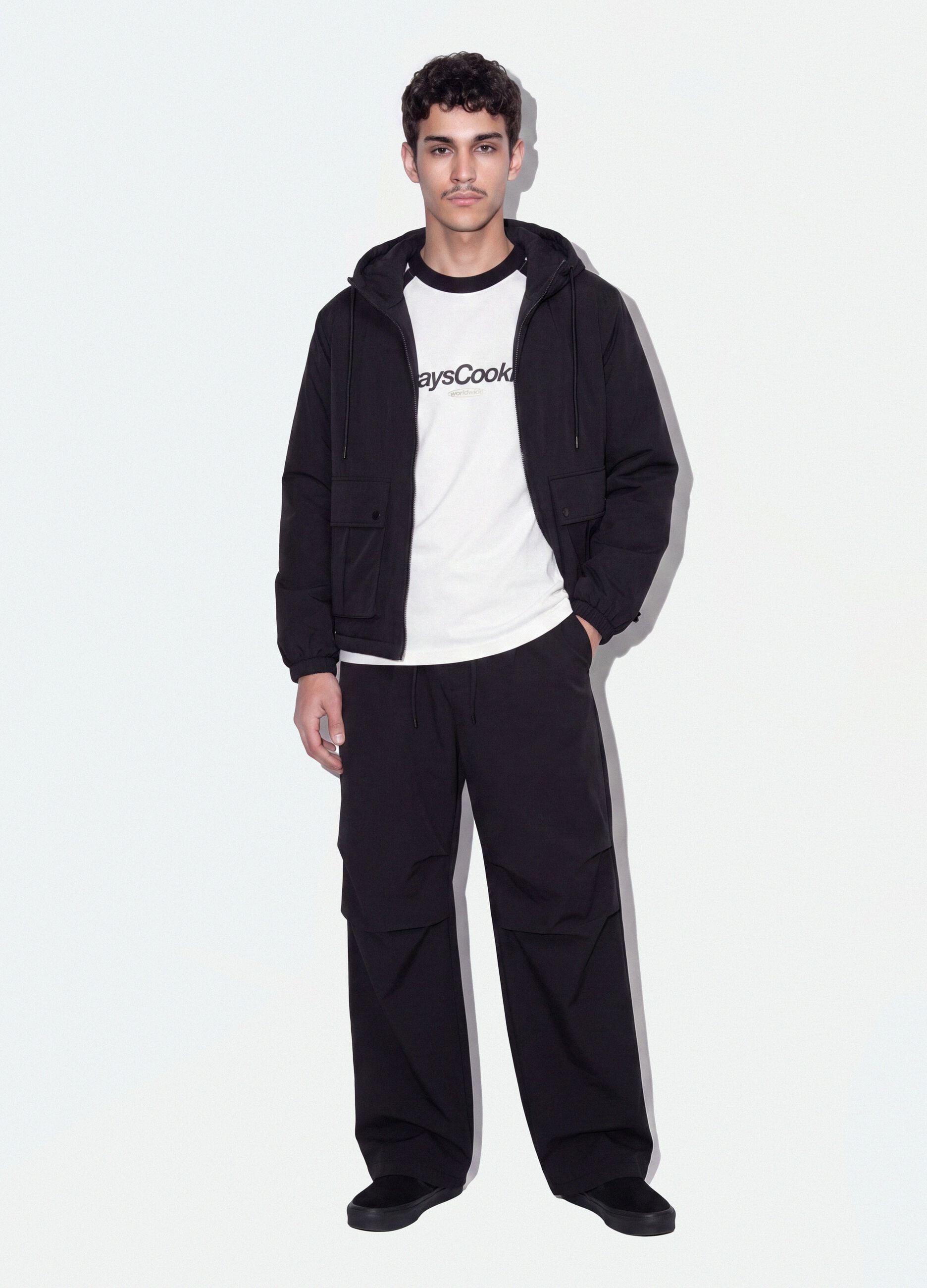 Black stretch-fabric parachute-fit trousers