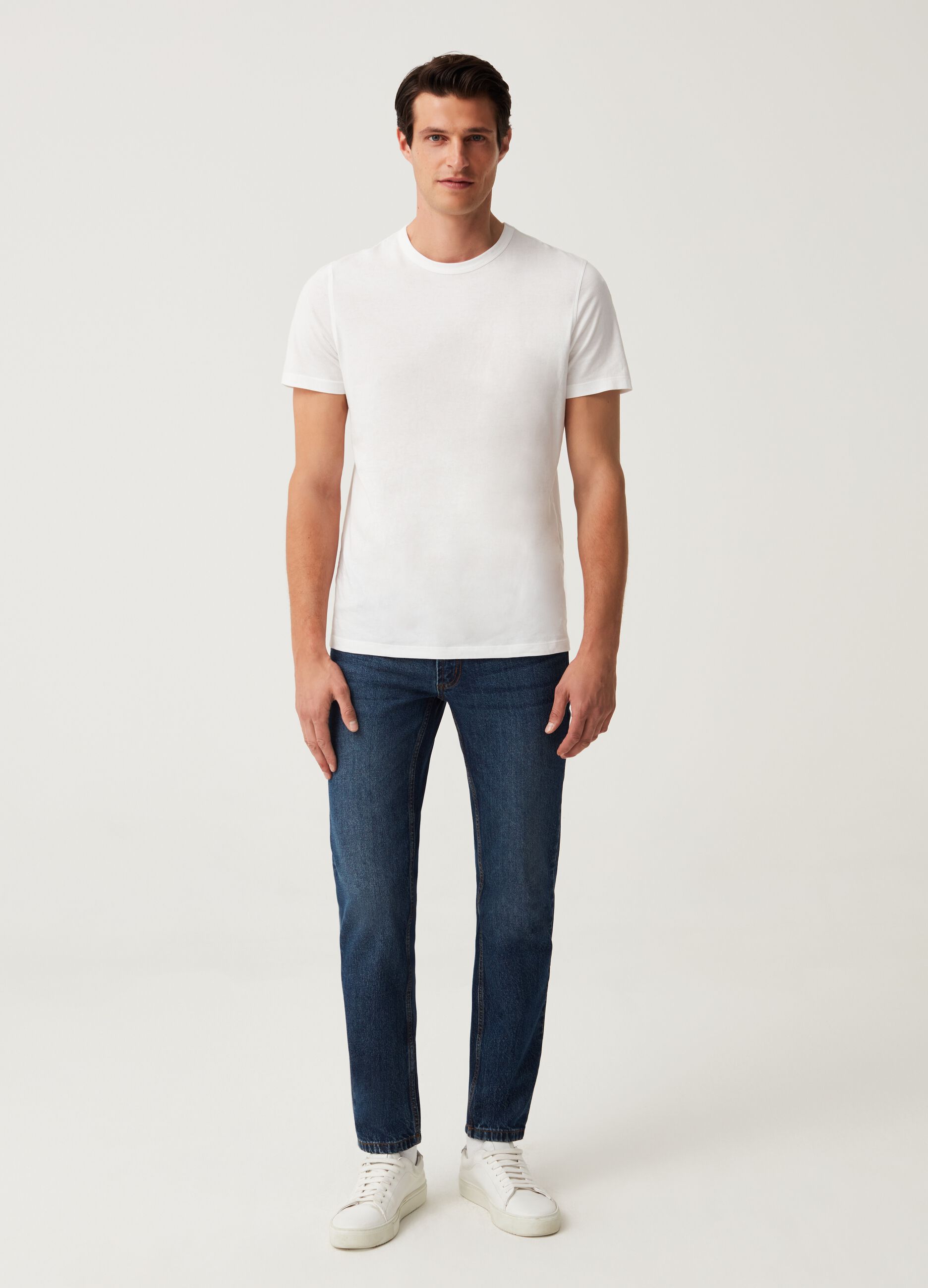 Jeans slim fit con scoloriture