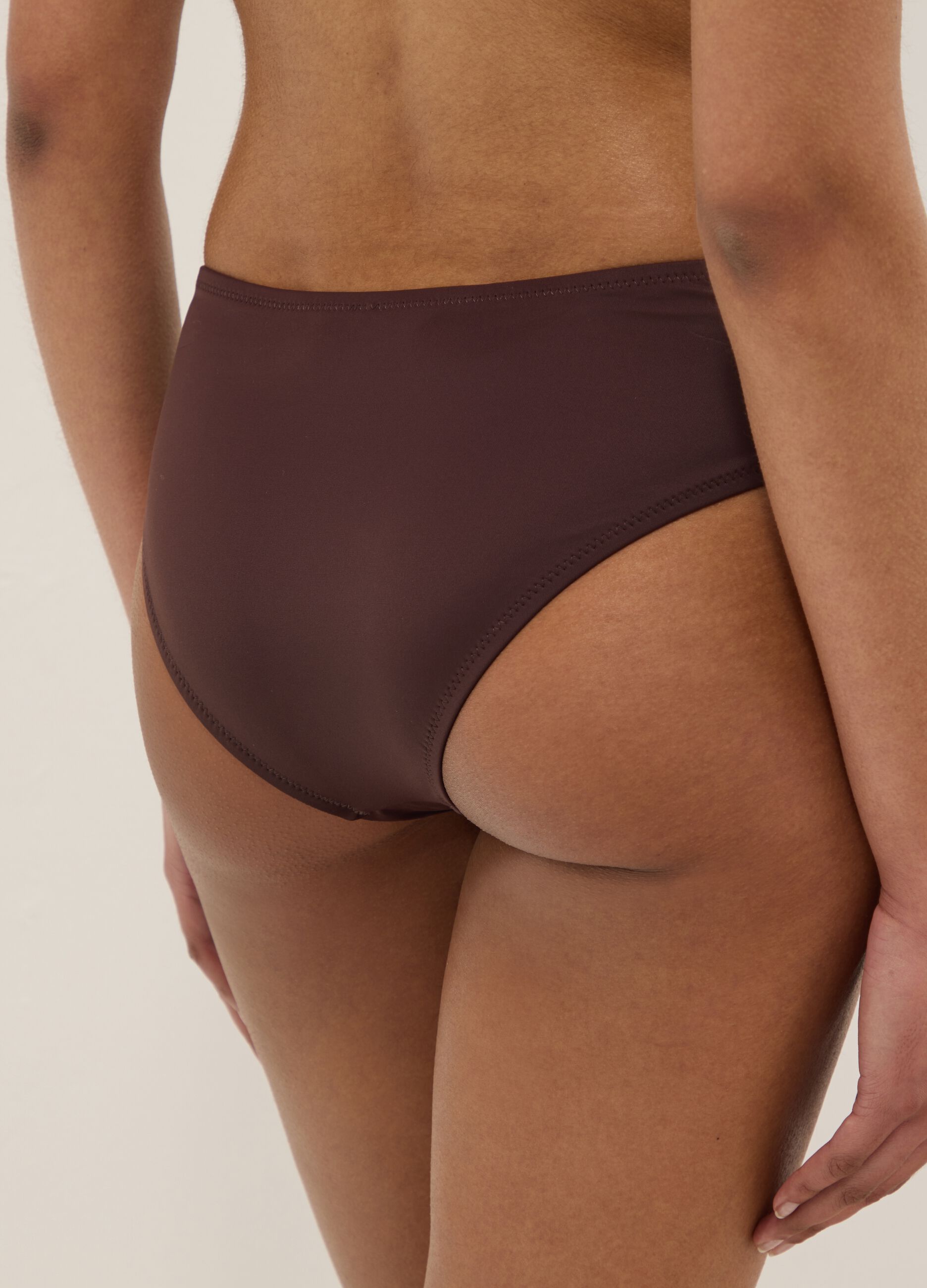 Brown stretch swim briefs with side ruching