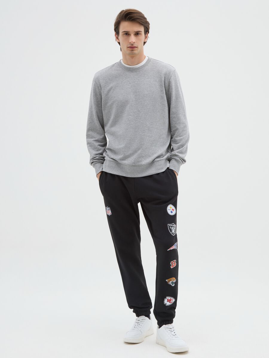 Pantaloni in misto cotone nero con loghi NFL_0