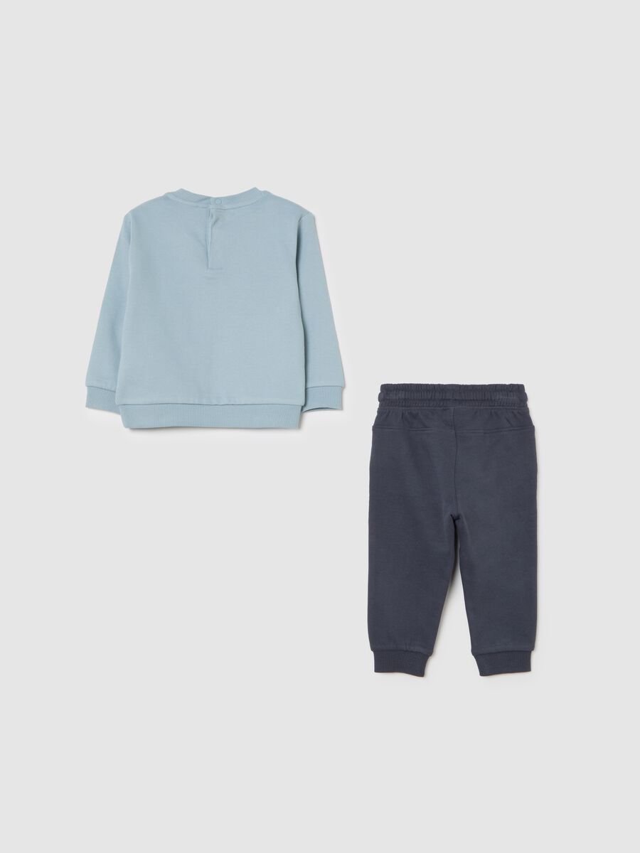 Blue cotton toddler set featuring a bear design_1