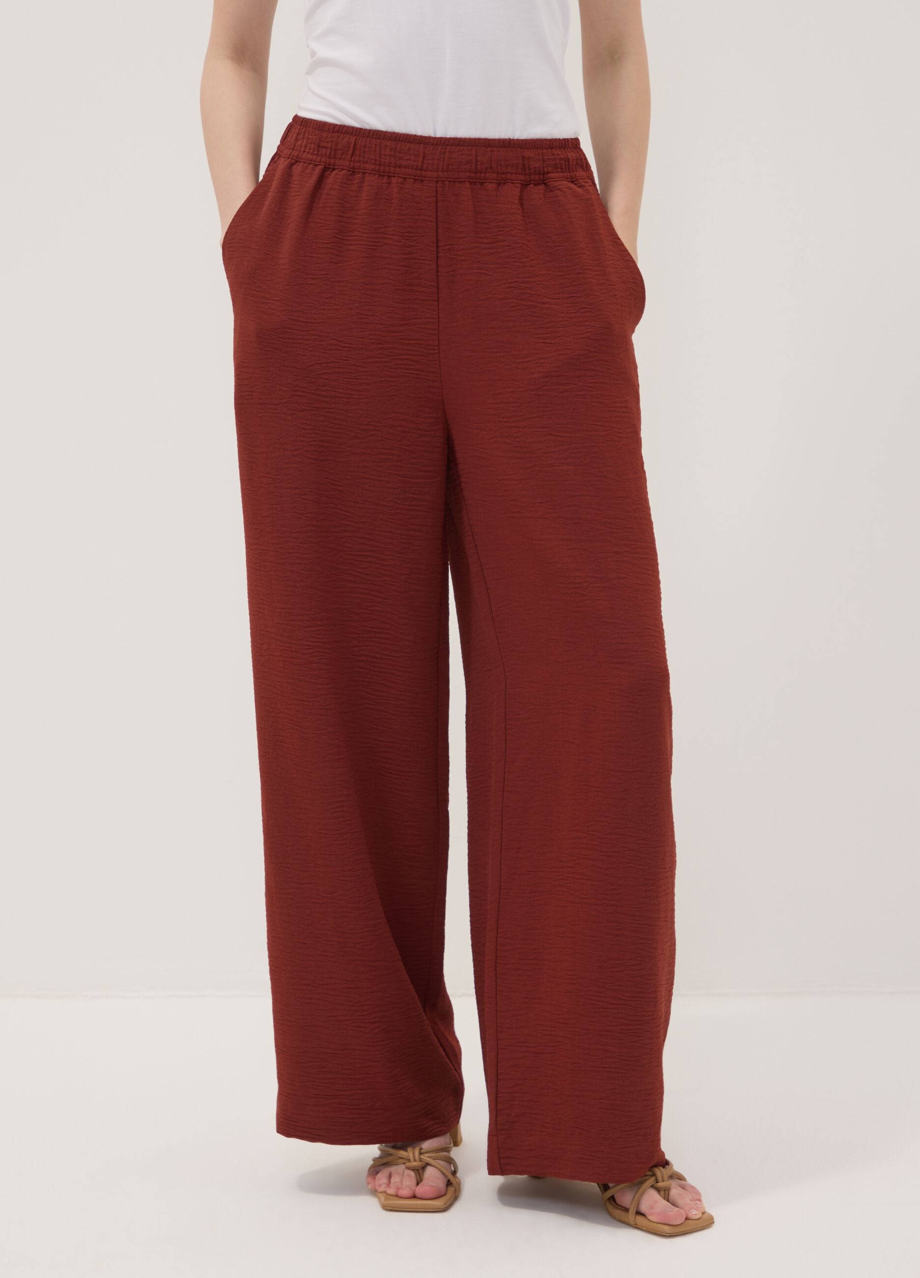 Red wide-leg trousers with elasticated waistband