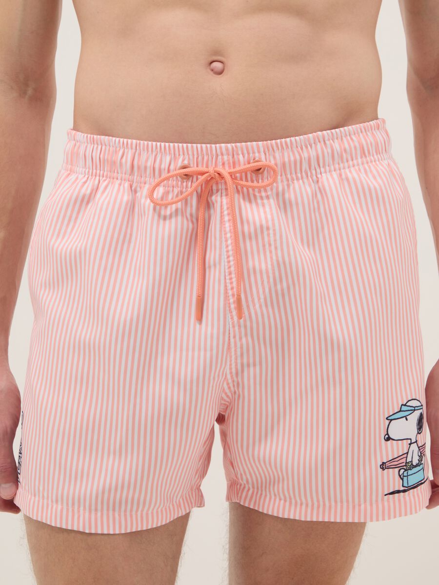 White and pink striped swim trunks with Peanuts print_1