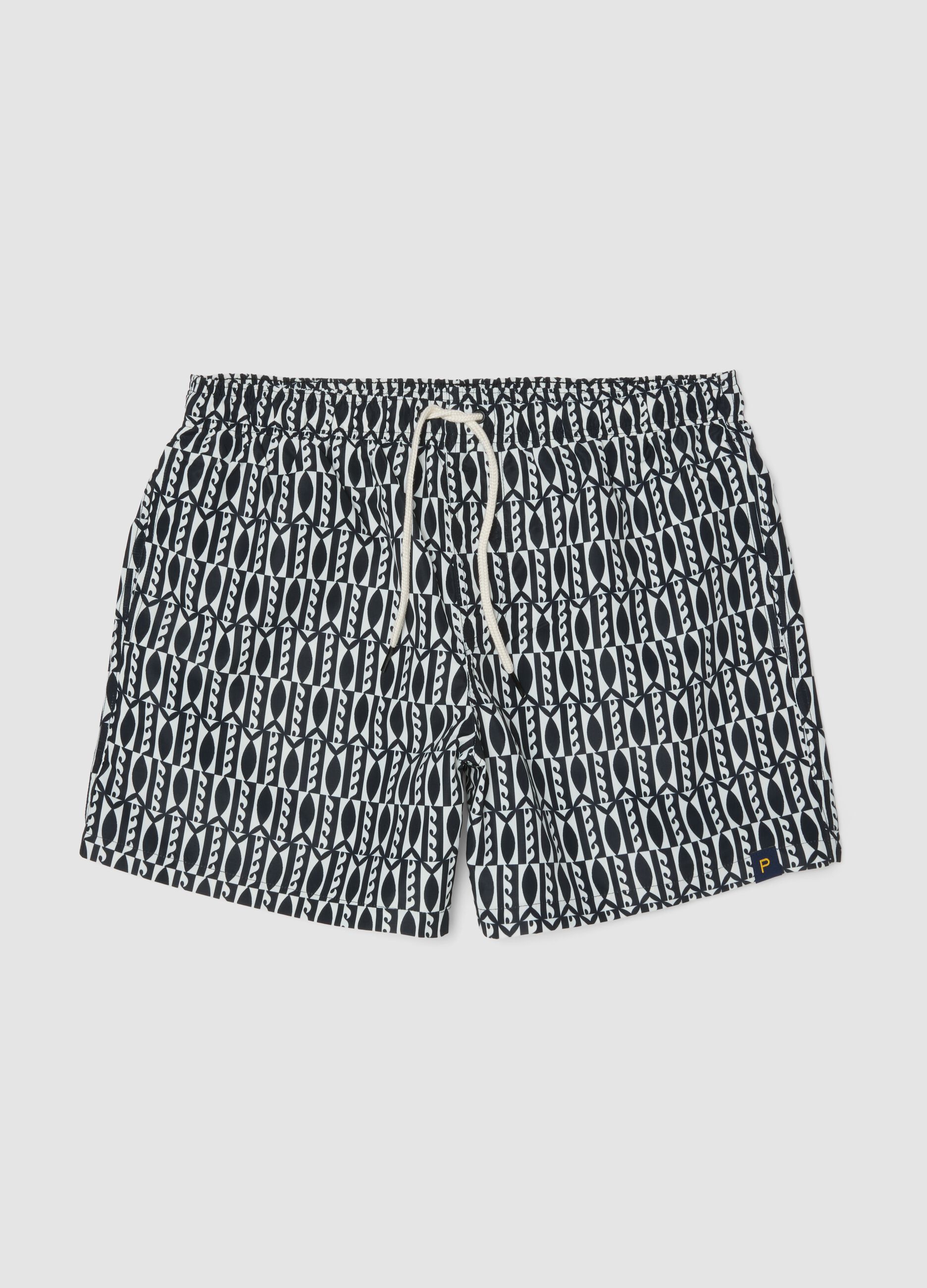 Blue swim shorts with graphic print