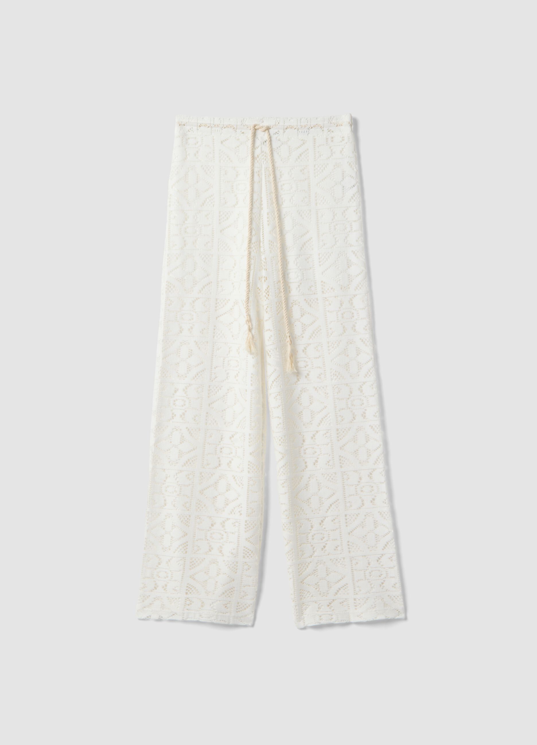 White openwork wide-leg trousers with elasticated waistband