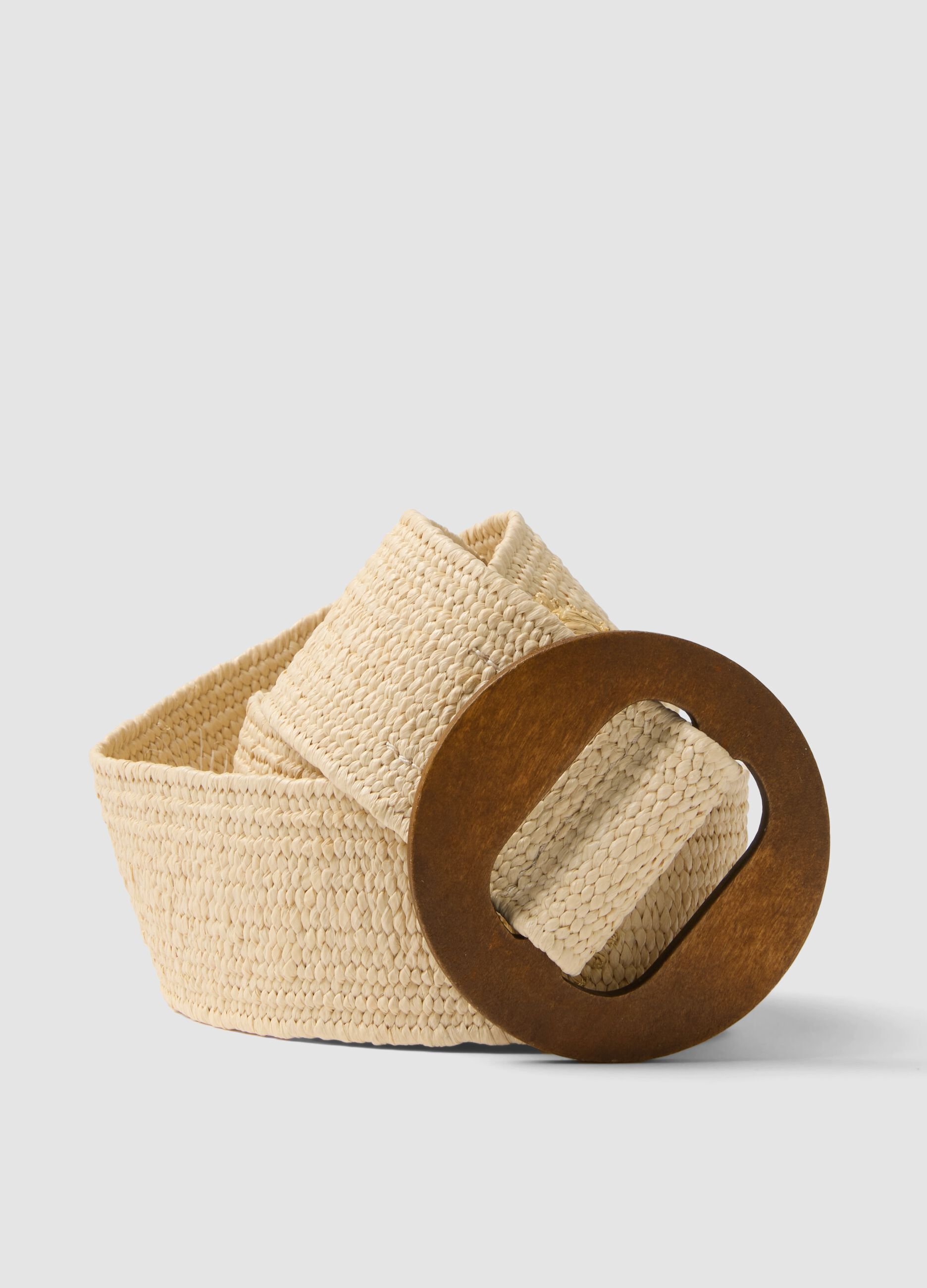 Beige woven belt with brown wooden buckle and embellishments