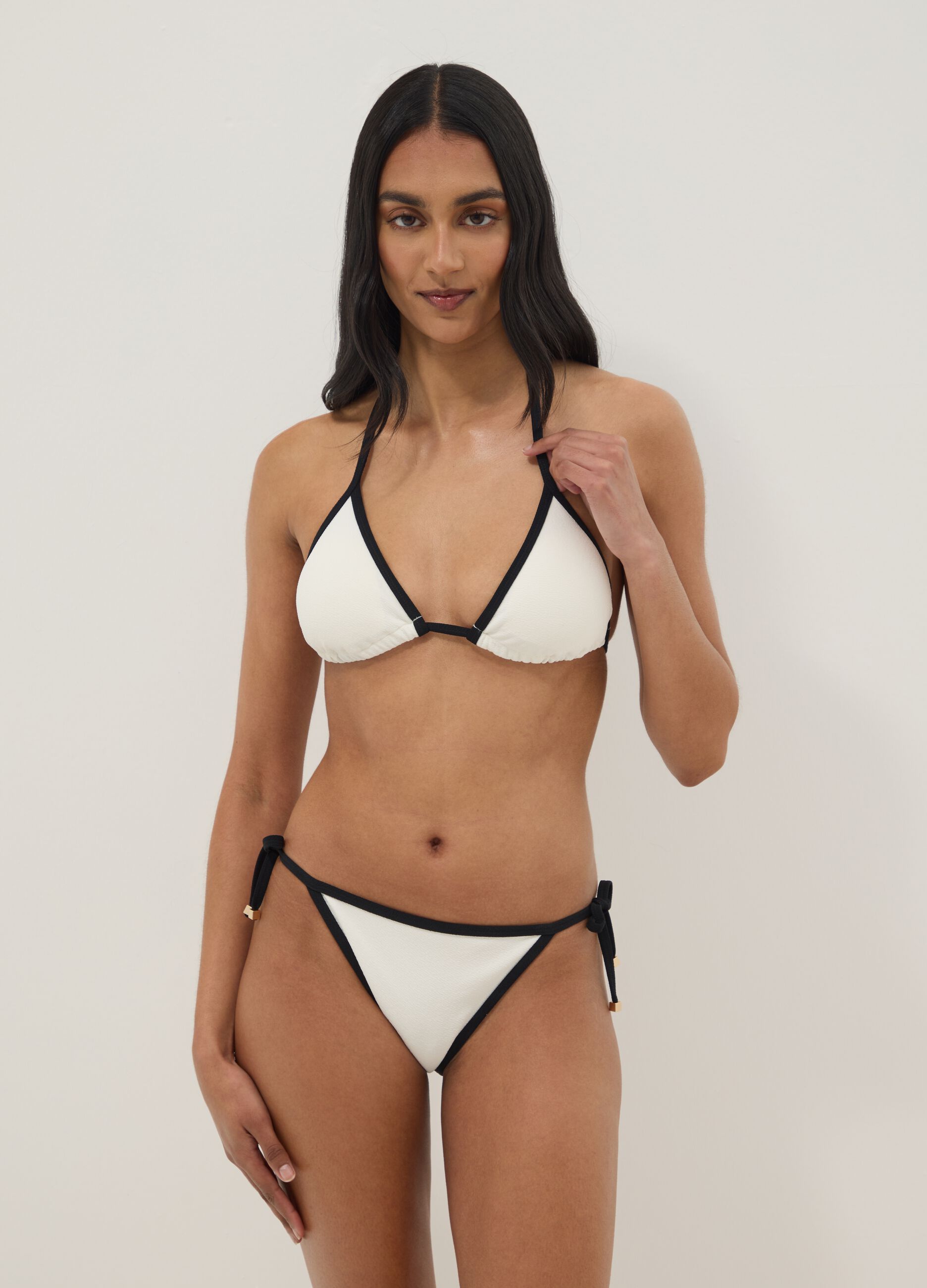 Black and white stretch bikini bottoms with tie sides