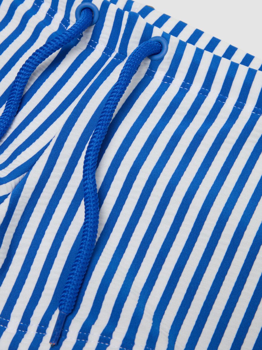 Blue and white stretch swim trunks_2